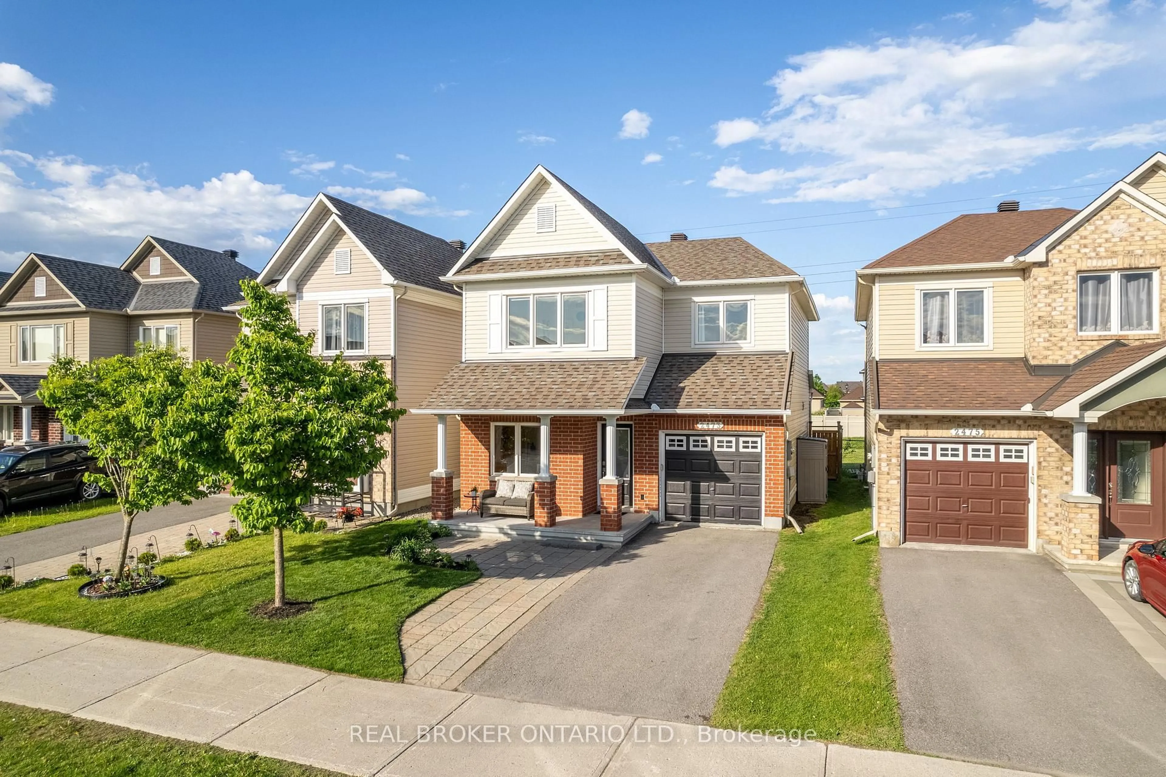Home with brick exterior material, street for 2473 Esprit Dr, Orleans Ontario K4A 0S6