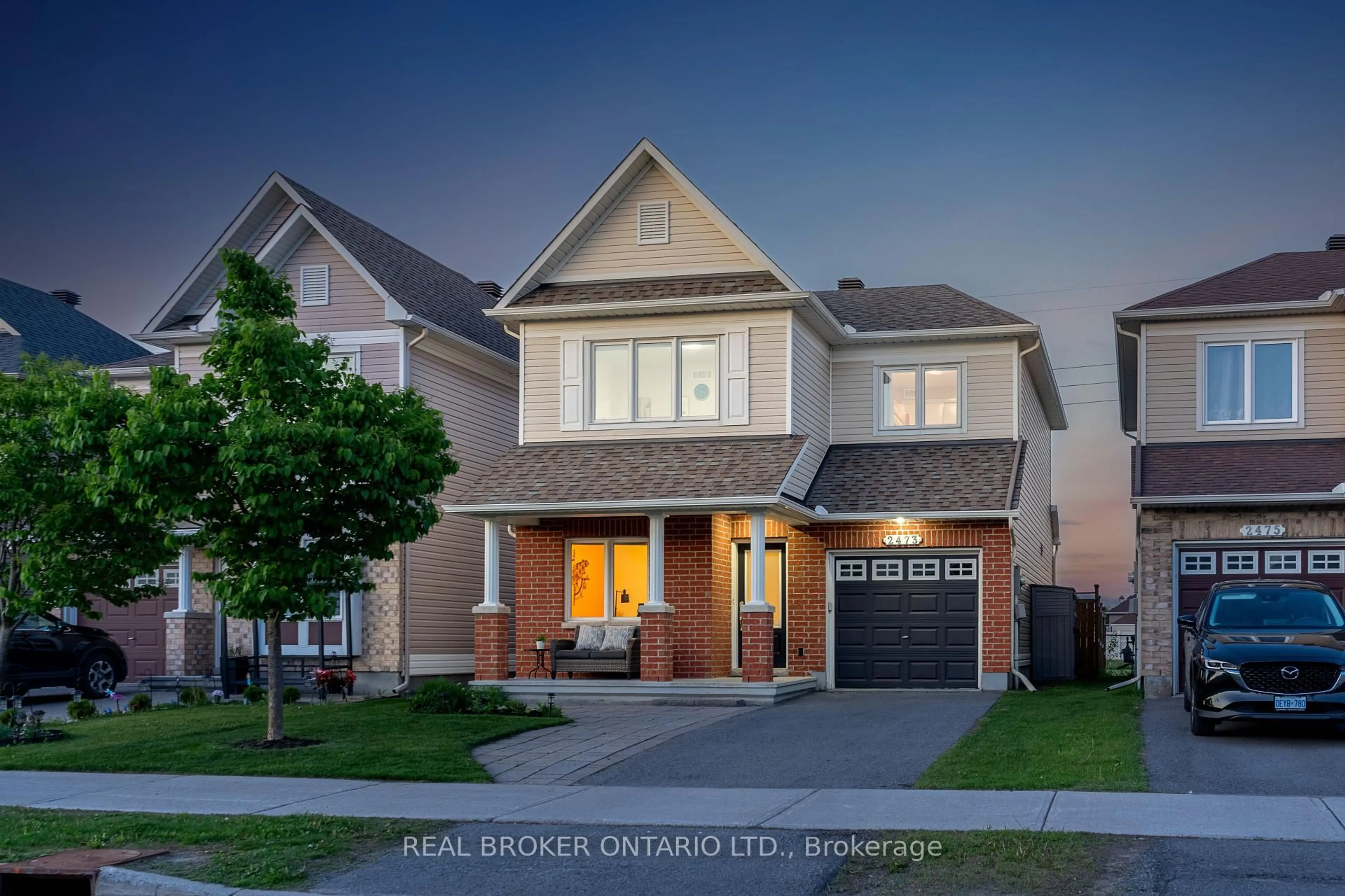 Home with brick exterior material, street for 2473 Esprit Dr, Orleans Ontario K4A 0S6