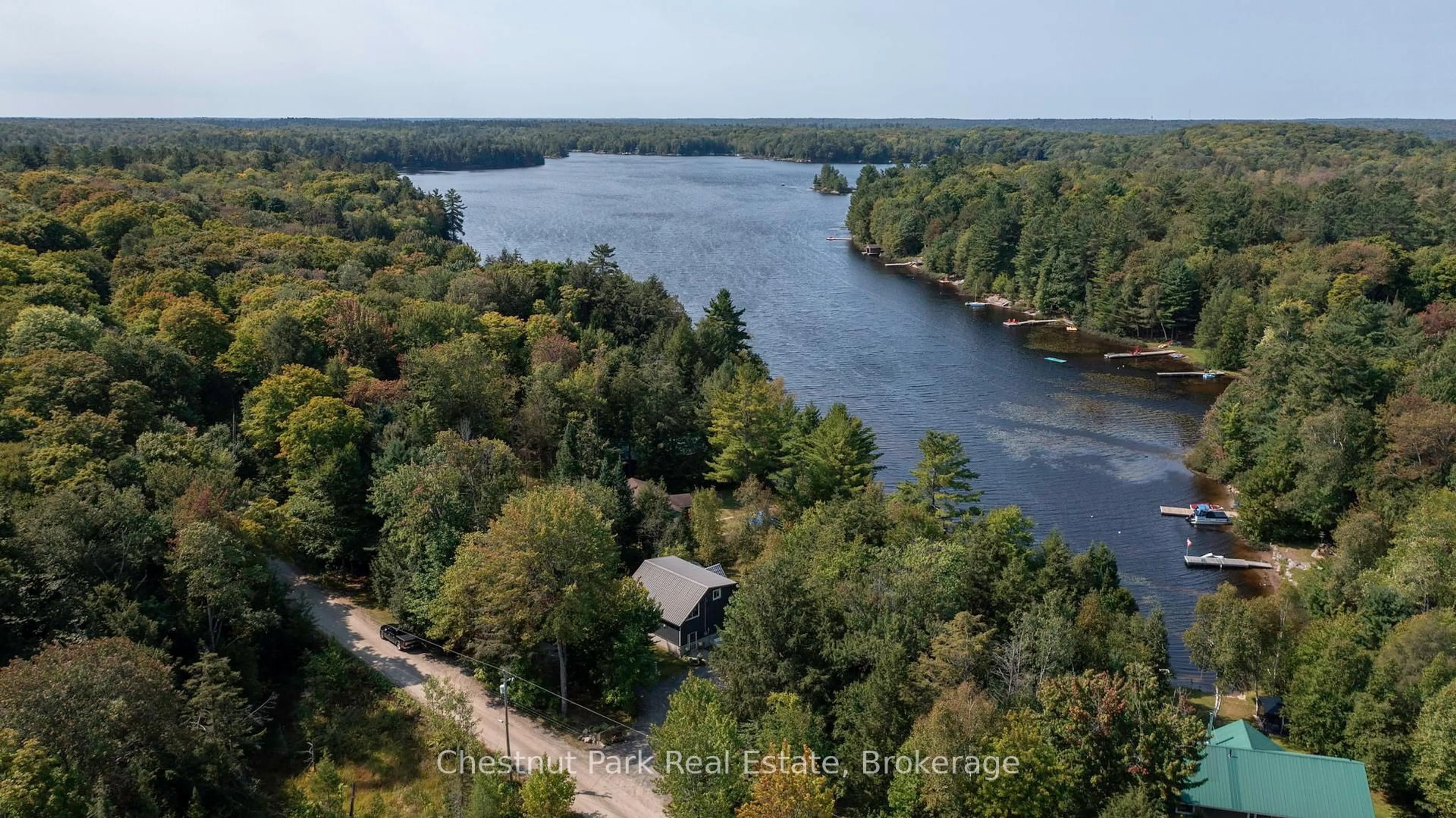 A pic from outside/outdoor area/front of a property/back of a property/a pic from drone, water/lake/river/ocean view for 954 Dickie Lake Rd, Lake of Bays Ontario P0B 1A0