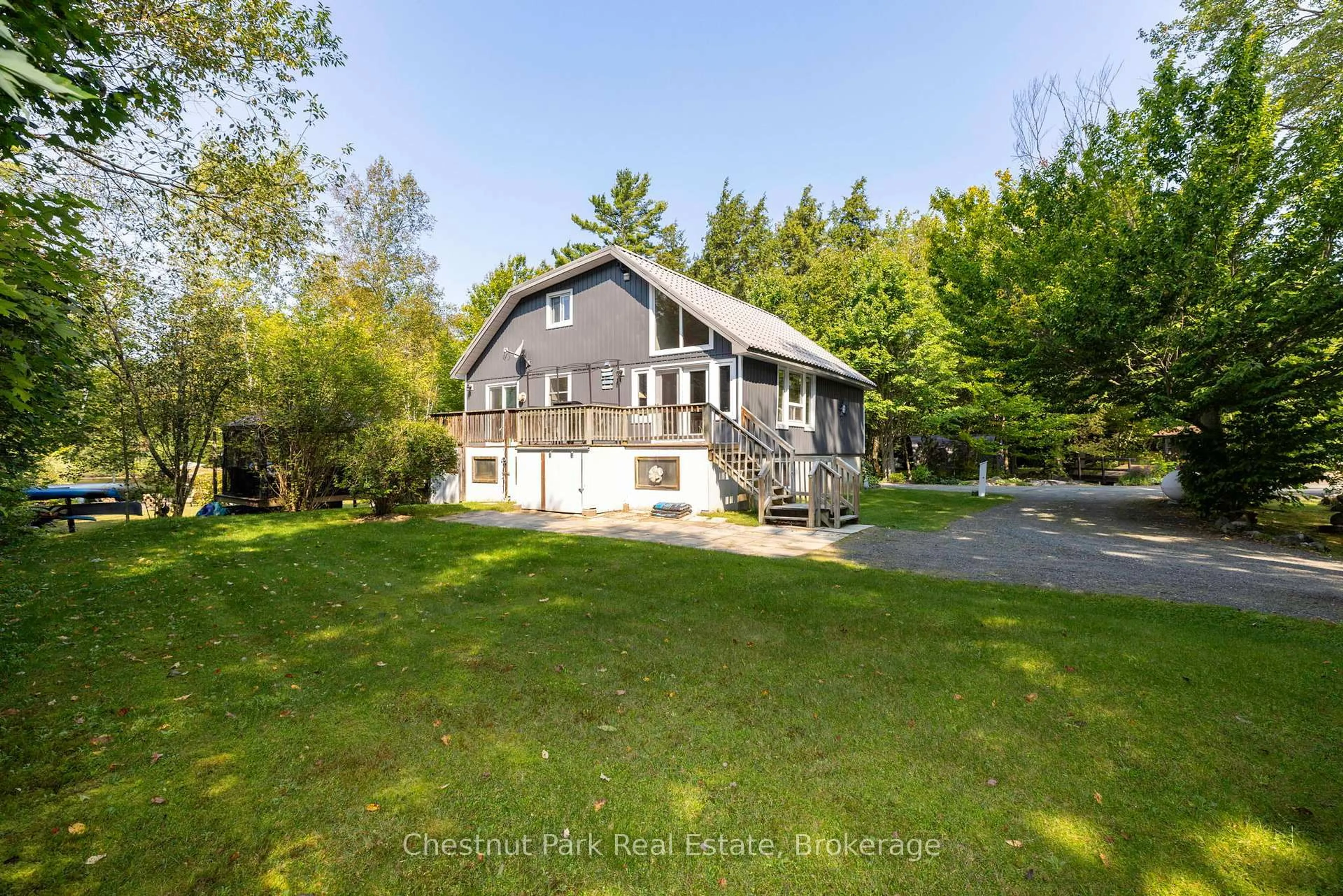 A pic from outside/outdoor area/front of a property/back of a property/a pic from drone, water/lake/river/ocean view for 954 Dickie Lake Rd, Lake of Bays Ontario P0B 1A0