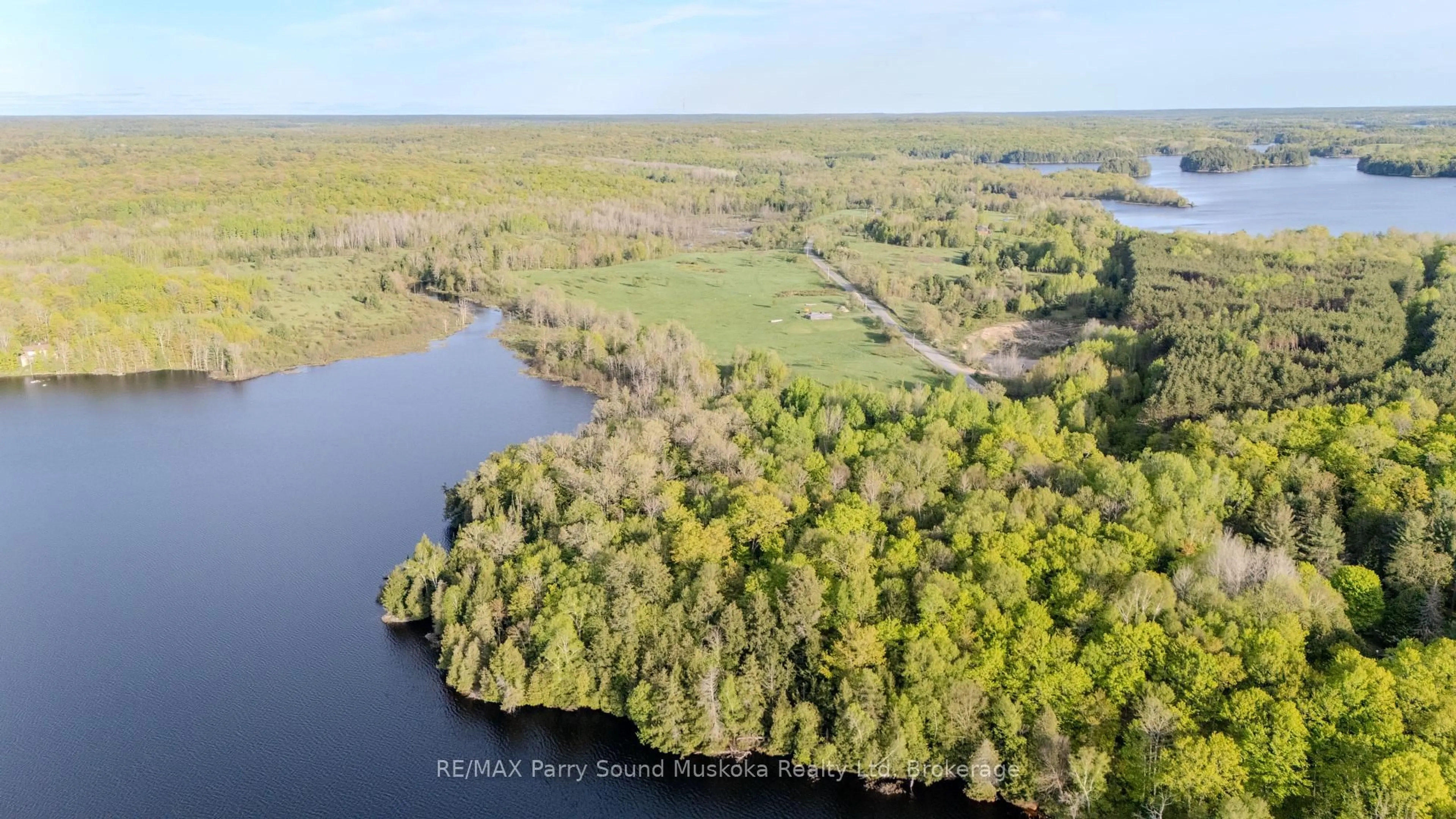 A pic from outside/outdoor area/front of a property/back of a property/a pic from drone, water/lake/river/ocean view for 82 Bradley Rd, Seguin Ontario P2A 2W9