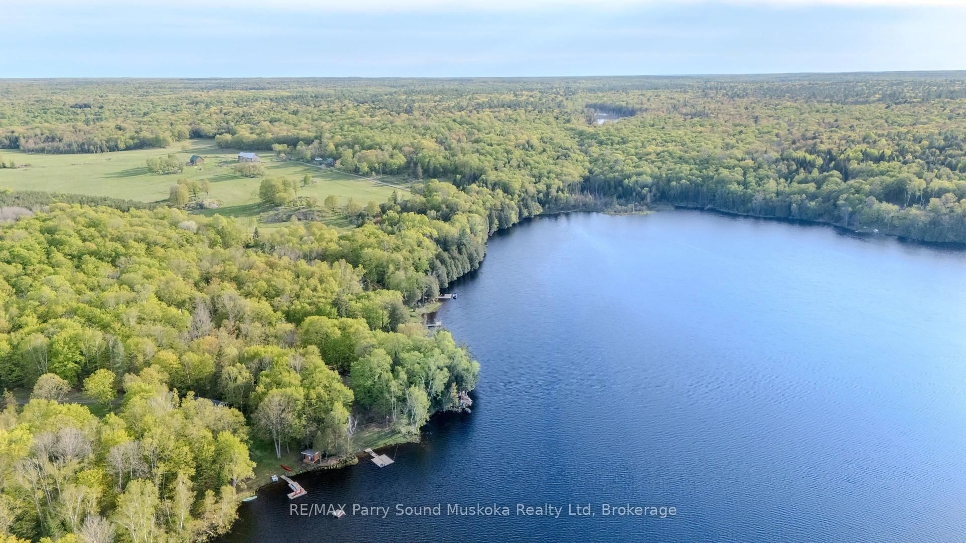 A pic from outside/outdoor area/front of a property/back of a property/a pic from drone, water/lake/river/ocean view for 82 Bradley Rd, Seguin Ontario P2A 2W9
