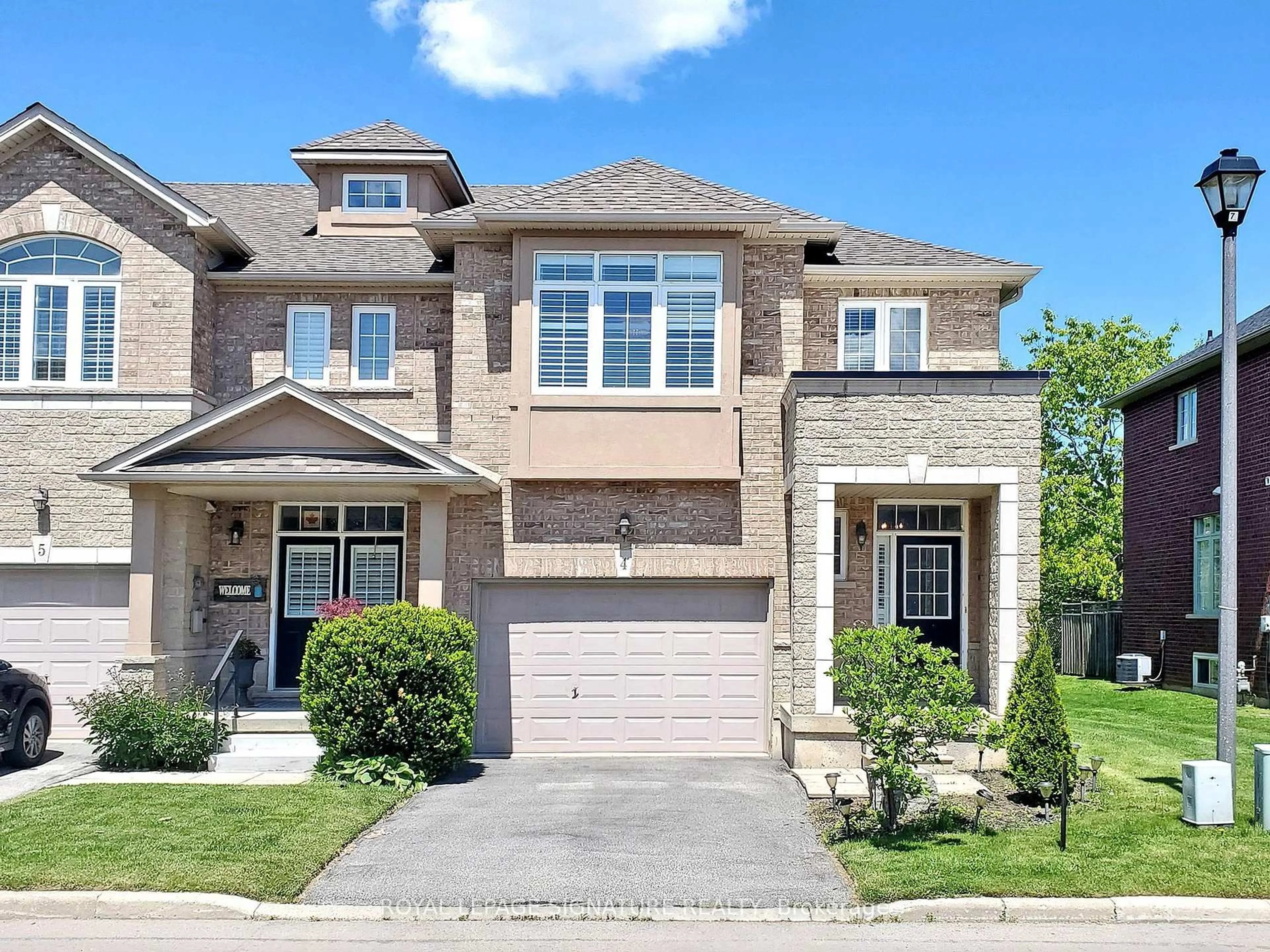 Home with brick exterior material, street for 99 Panabaker Dr #4, Hamilton Ontario L9G 5E3