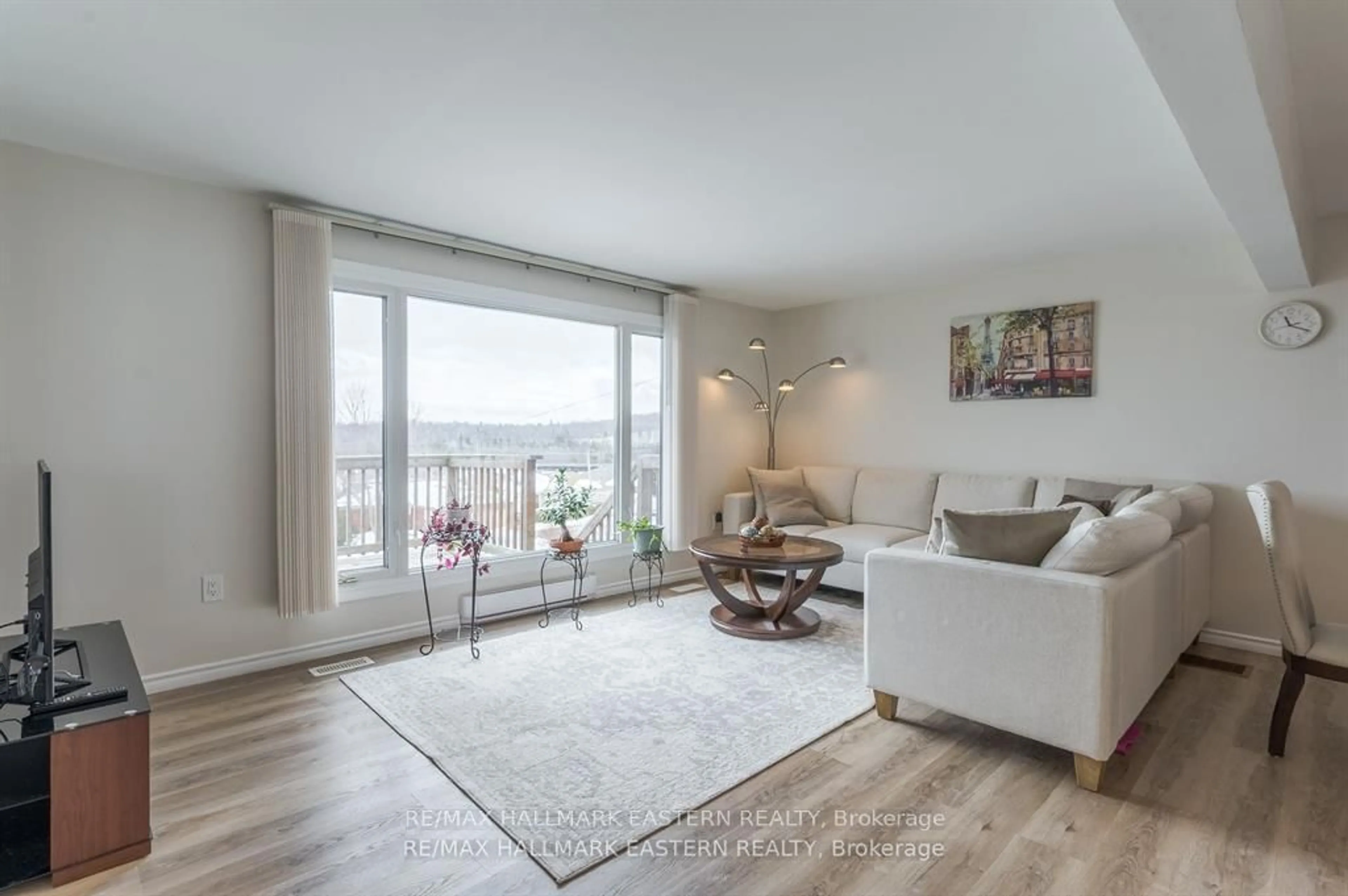 Living room with furniture, wood/laminate floor for 145 Park Lane, Asphodel-Norwood Ontario K0L 1Y0