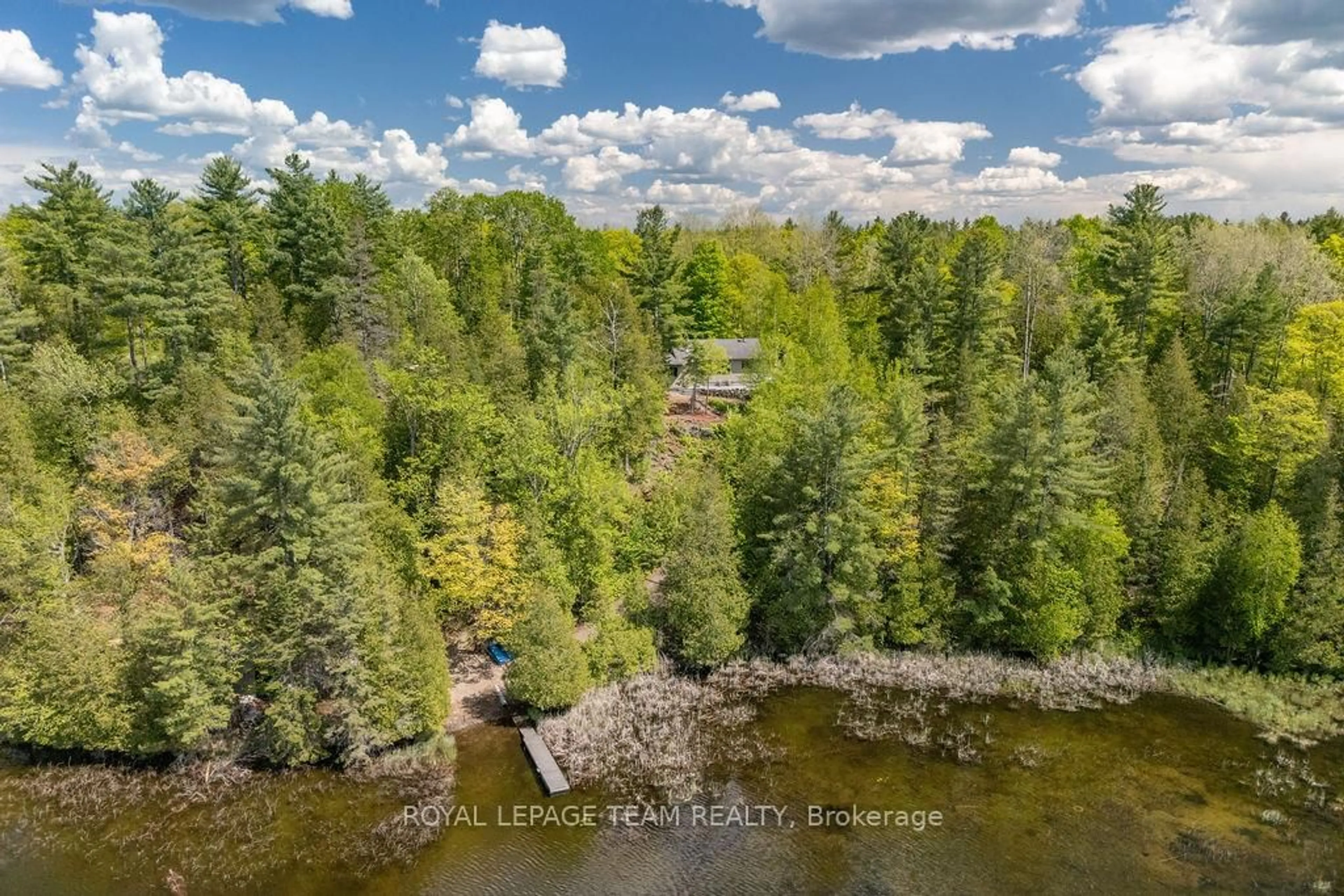 A pic from outside/outdoor area/front of a property/back of a property/a pic from drone, water/lake/river/ocean view for 861 Stones Lake Rd, Calabogie Ontario K0J 1H0