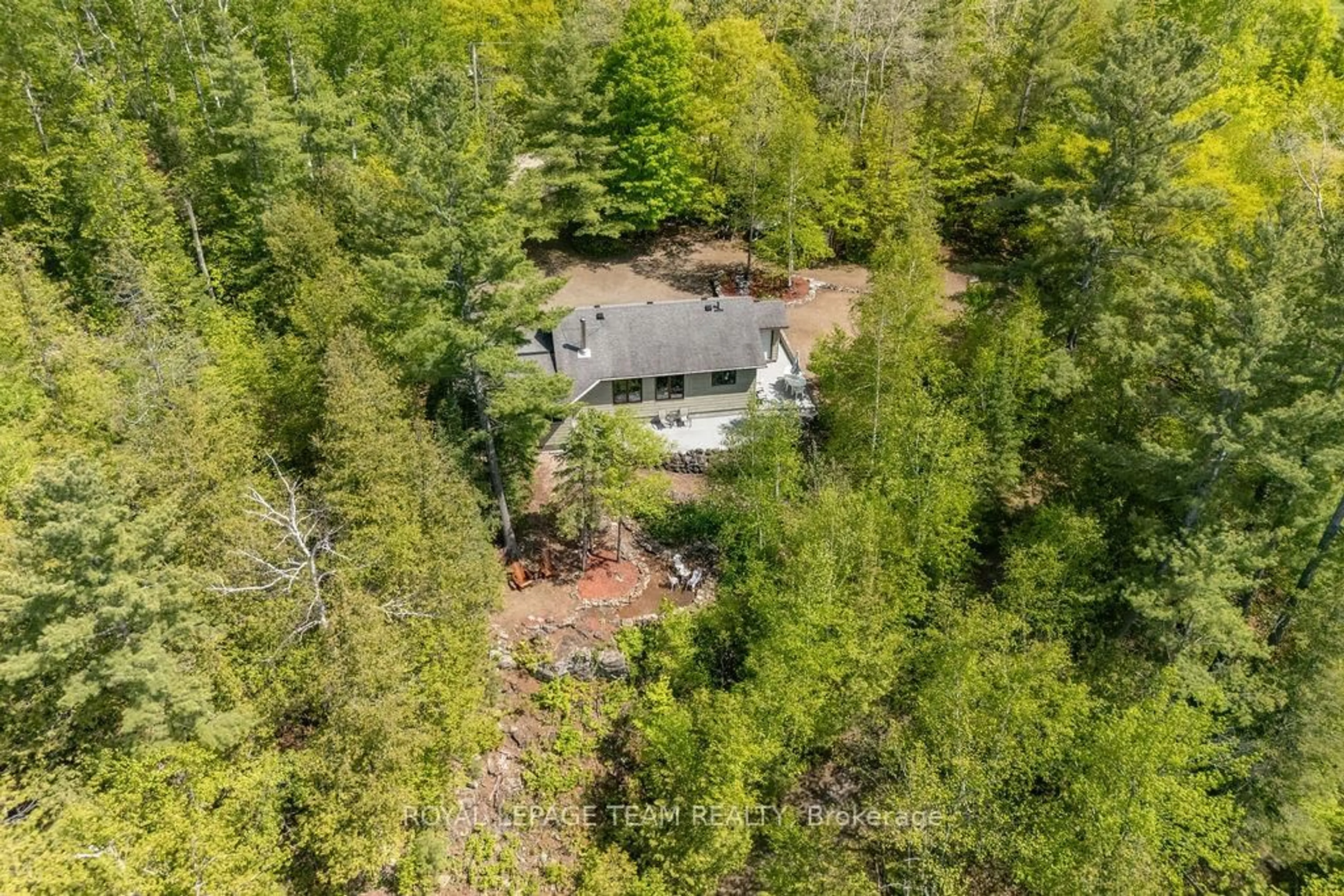 A pic from outside/outdoor area/front of a property/back of a property/a pic from drone, forest/trees view for 861 Stones Lake Rd, Calabogie Ontario K0J 1H0