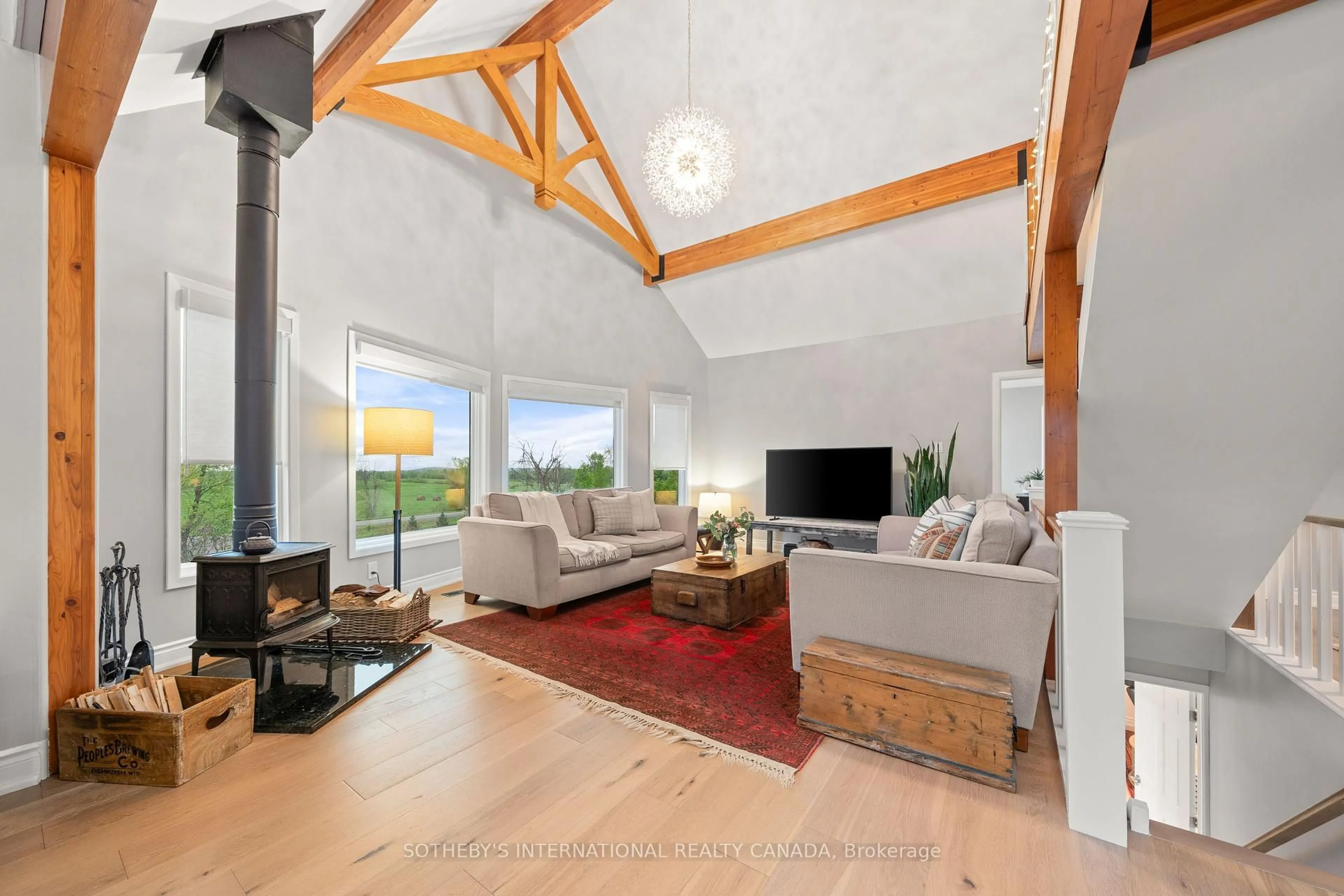 Living room with furniture, wood/laminate floor for 2965 Centre Line Rd, Limoges Ontario K0K 2M0