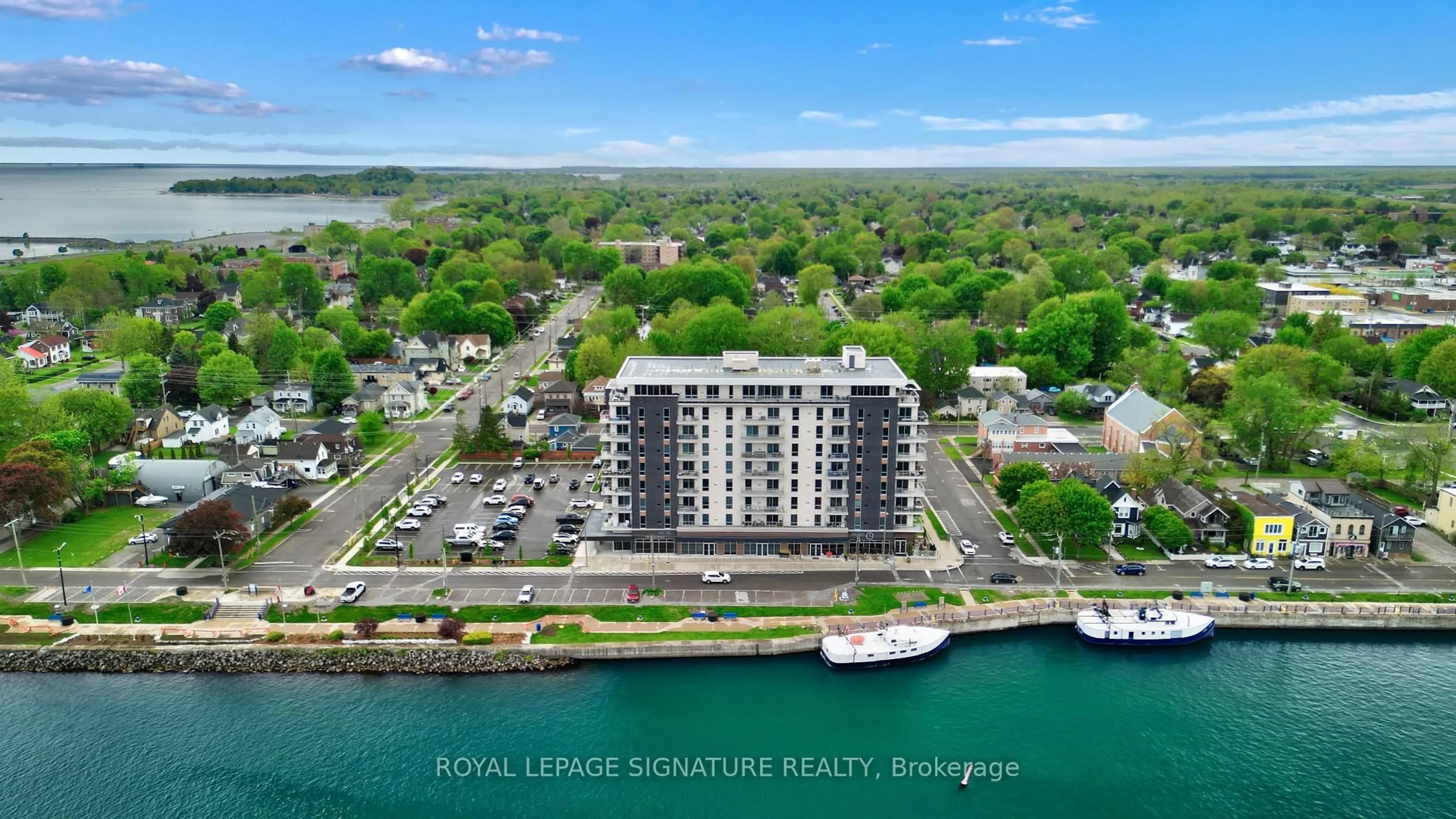 A pic from outside/outdoor area/front of a property/back of a property/a pic from drone, water/lake/river/ocean view for 118 West St #502, Port Colborne Ontario L3K 4C9