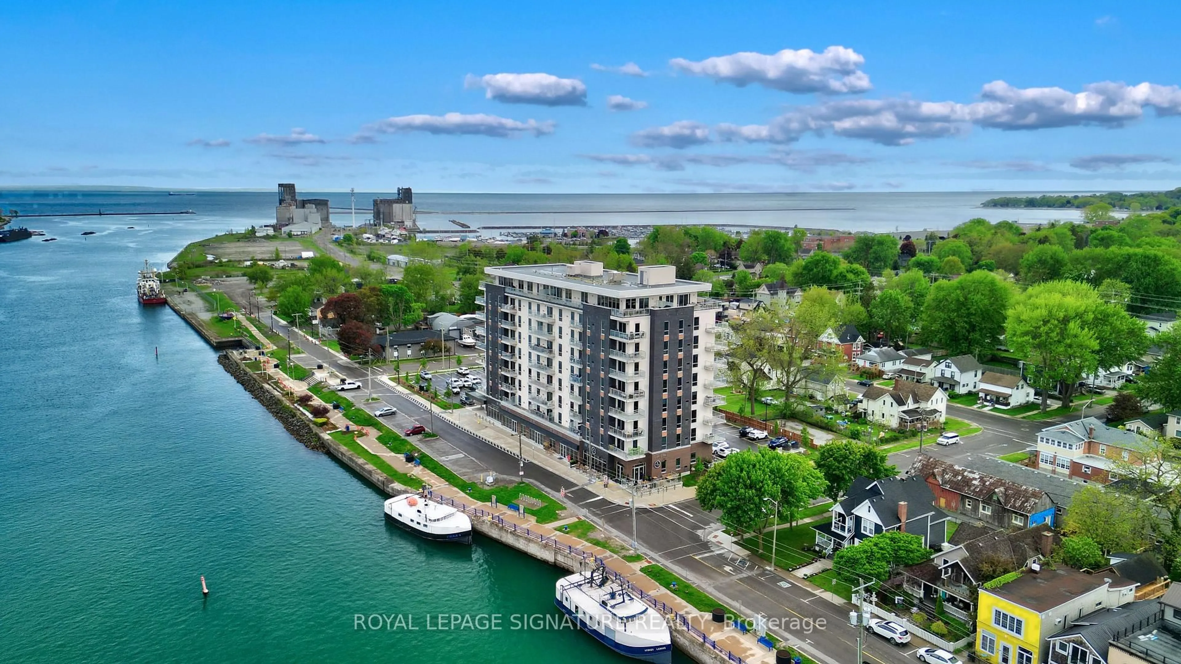 A pic from outside/outdoor area/front of a property/back of a property/a pic from drone, water/lake/river/ocean view for 118 West St #502, Port Colborne Ontario L3K 4C9