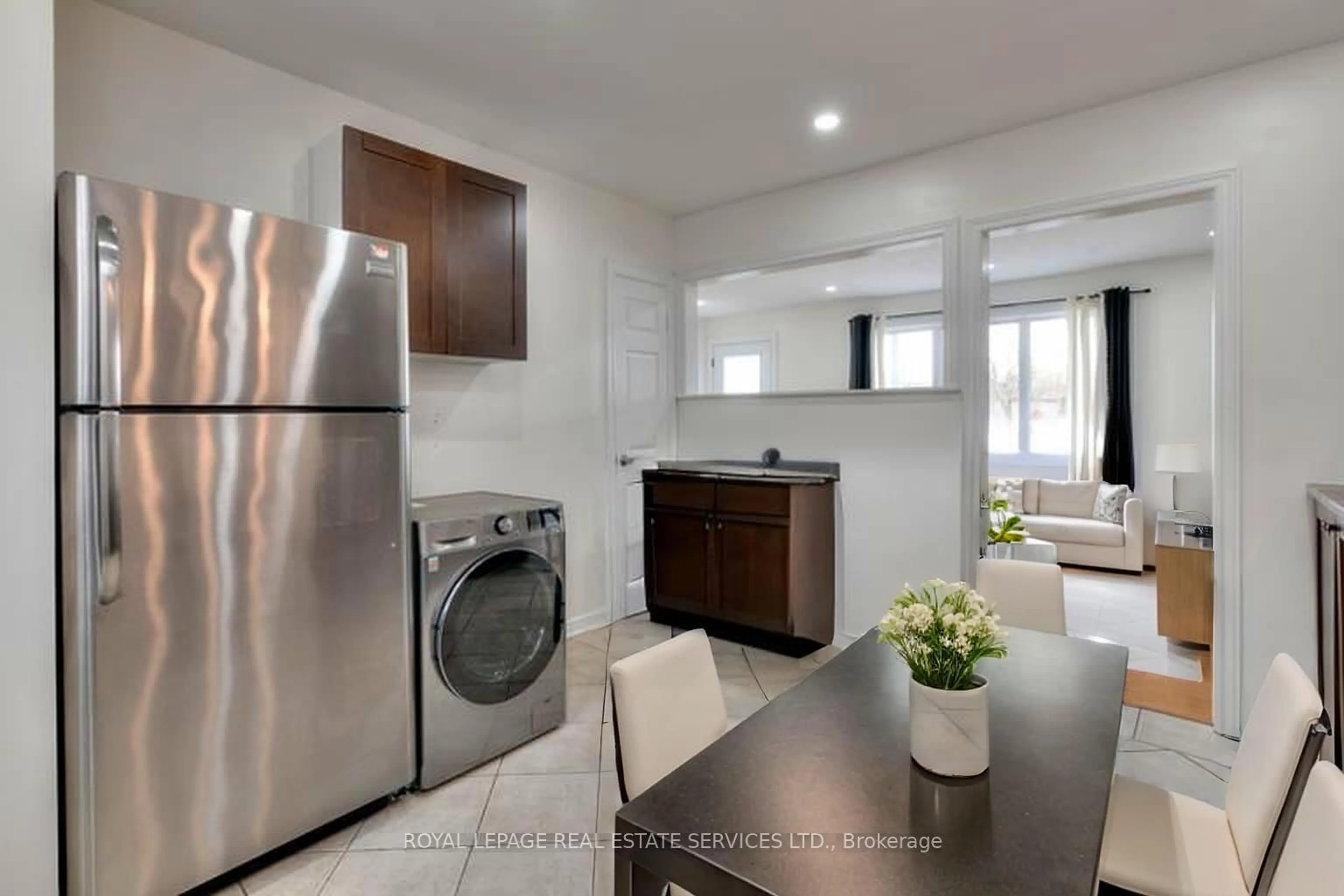 Kitchen with laundary machines, unknown for 484 Speedvale Ave, Guelph Ontario N1E 1P2