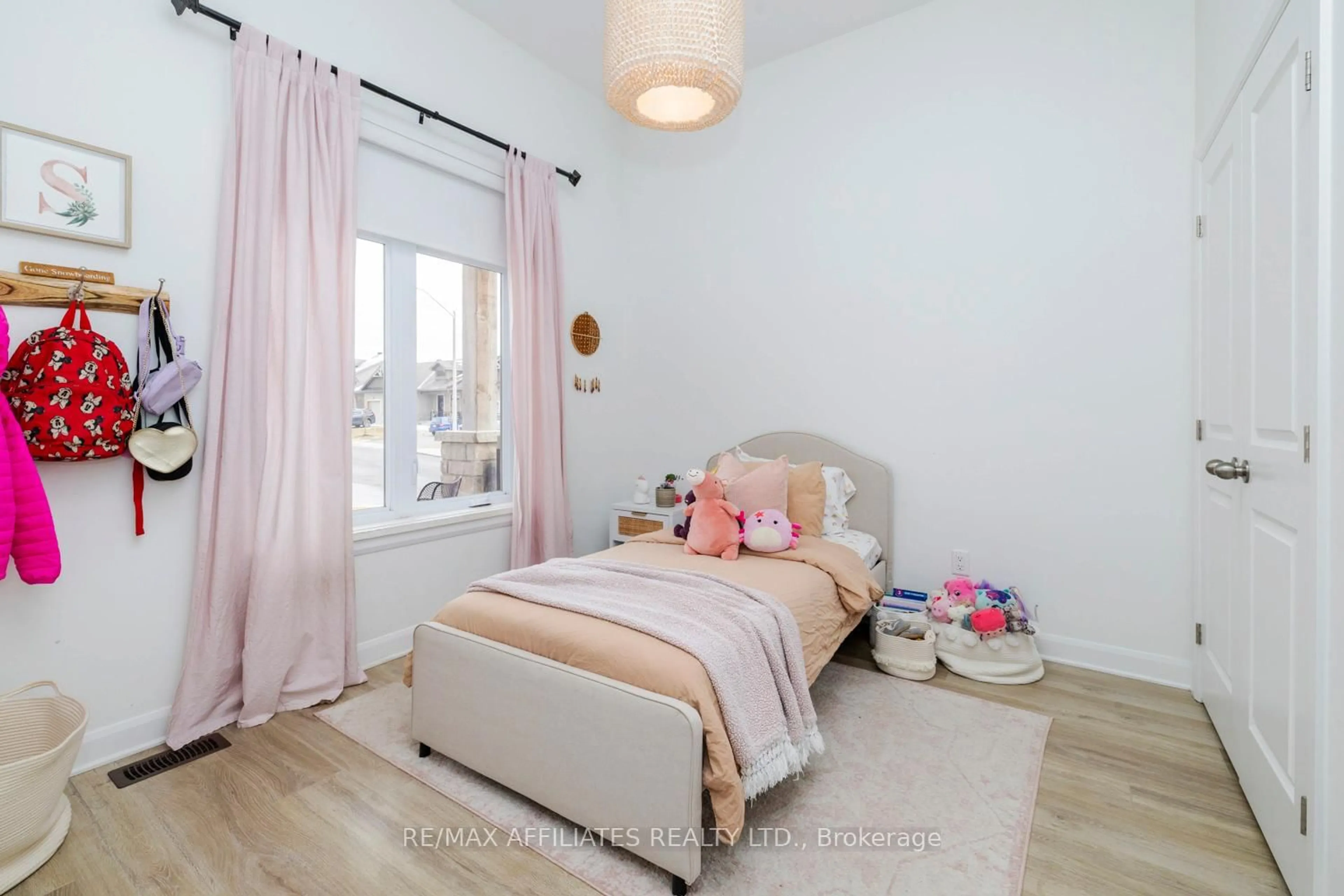 Bedroom with bed, wood/laminate floor for 20 Elmer West St, Almonte Ontario K0A 1A0