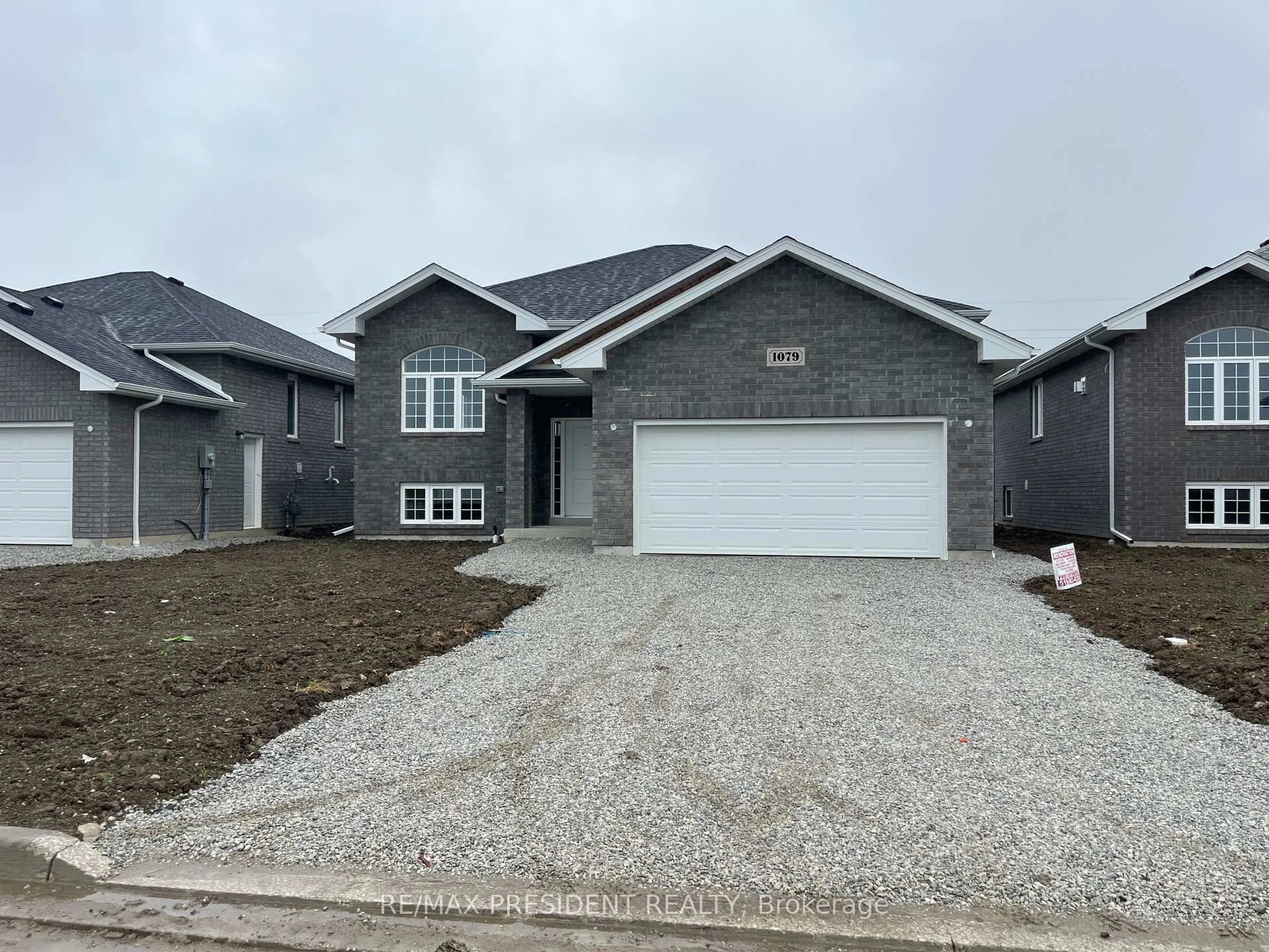 Home with brick exterior material, street for 1079 Aspen Ridge Cres, Lakeshore Ontario N0R 1A0