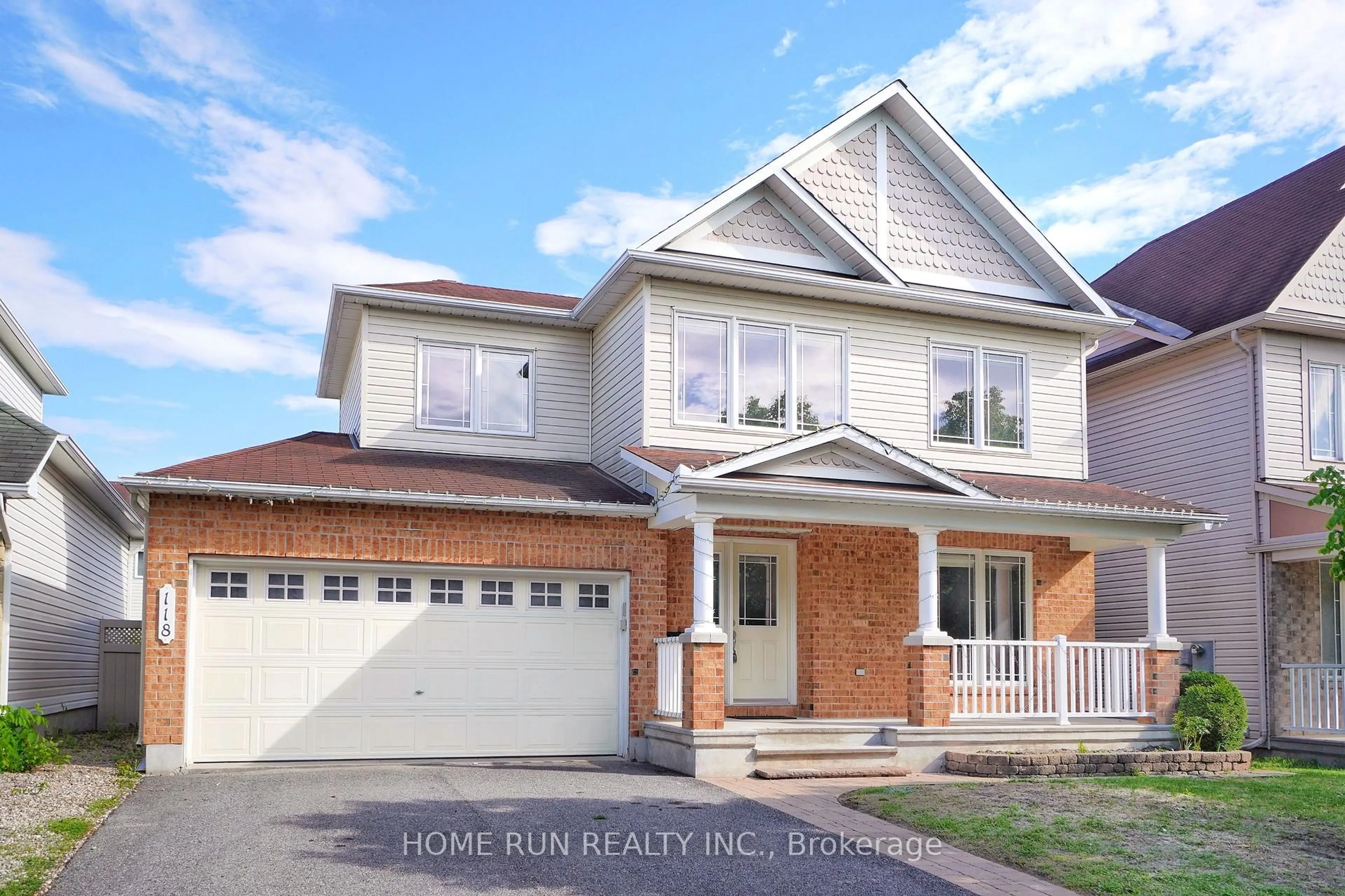 Home with brick exterior material, street for 118 TAPESTRY Dr, Ottawa Ontario K2J 0H3