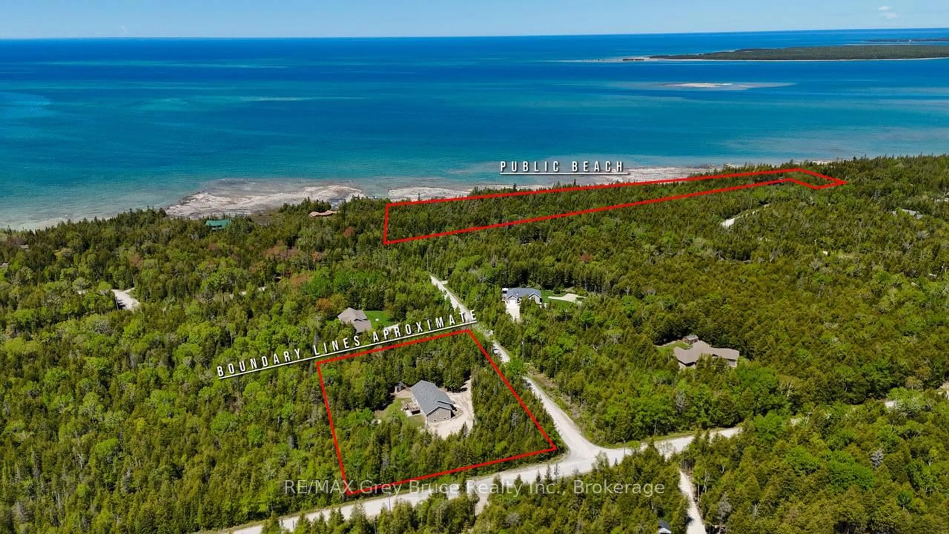 A pic from outside/outdoor area/front of a property/back of a property/a pic from drone, water/lake/river/ocean view for 114 Pike St, Northern Bruce Peninsula Ontario N0H 1W0