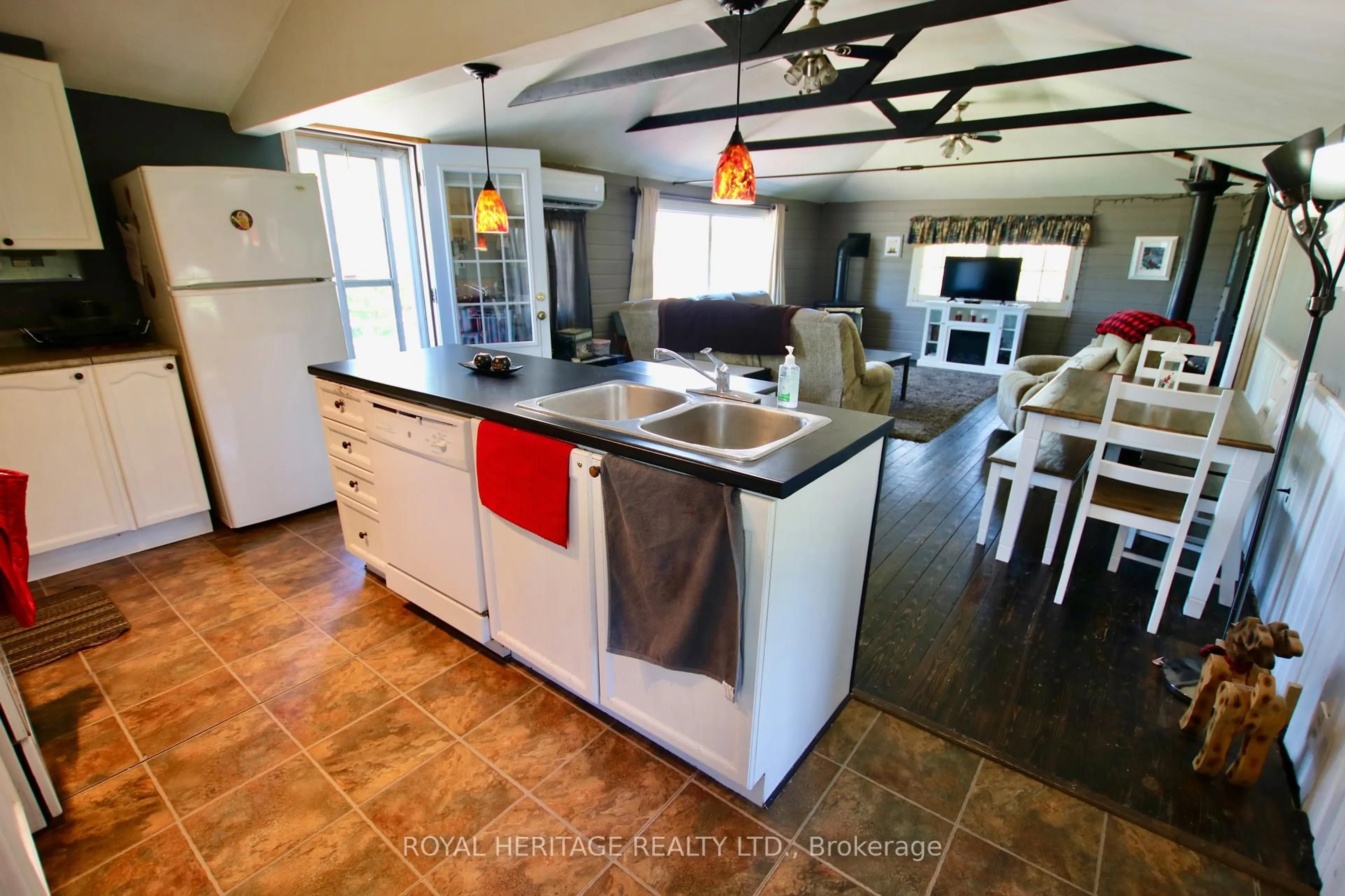 Open concept kitchen, ceramic/tile floor for 63 Birchcliff Ave, Kawartha Lakes Ontario K0M 1L0