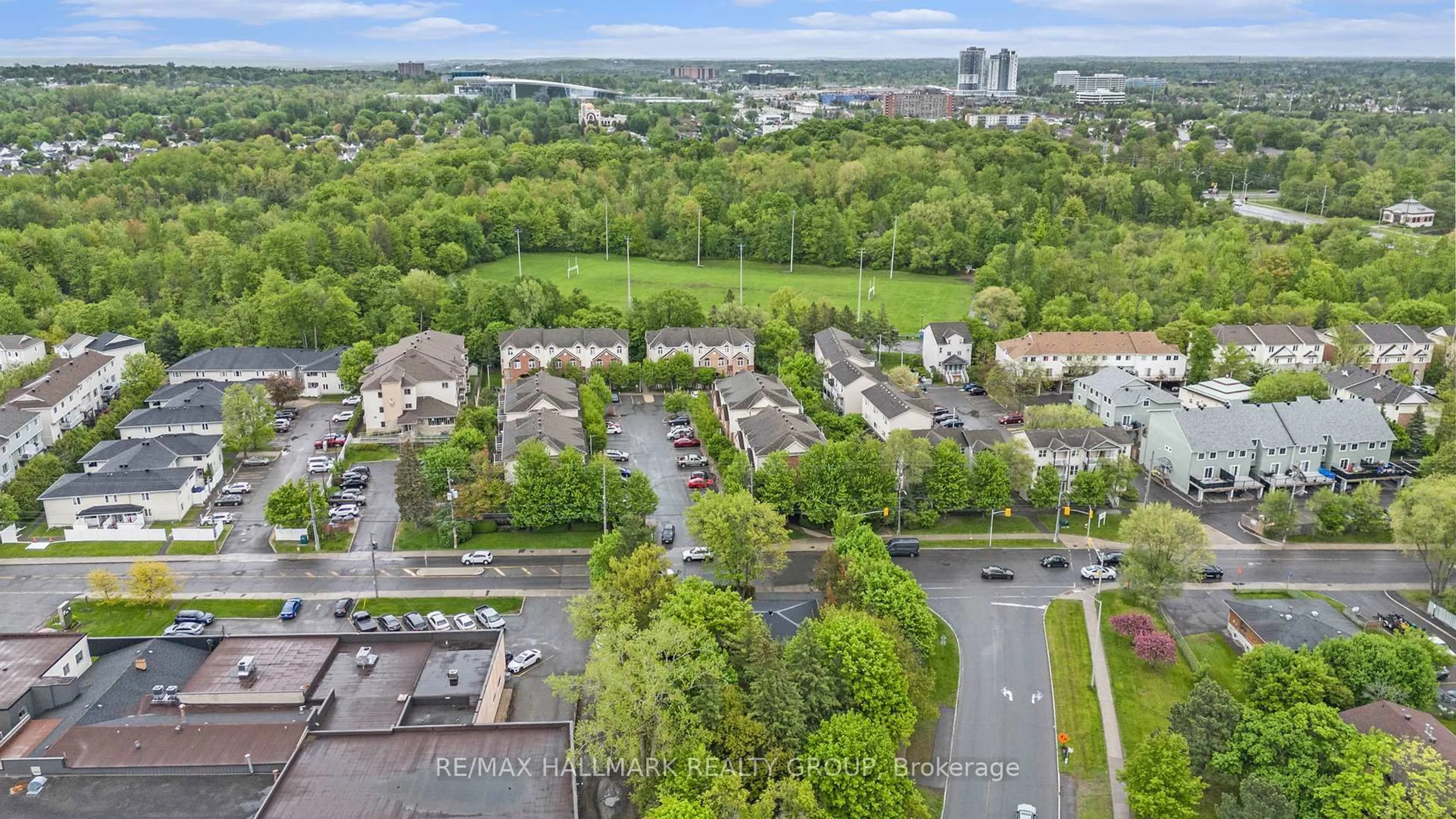 A pic from outside/outdoor area/front of a property/back of a property/a pic from drone, city buildings view from balcony for 1128 Cummings Ave, Ottawa Ontario K1J 7R8