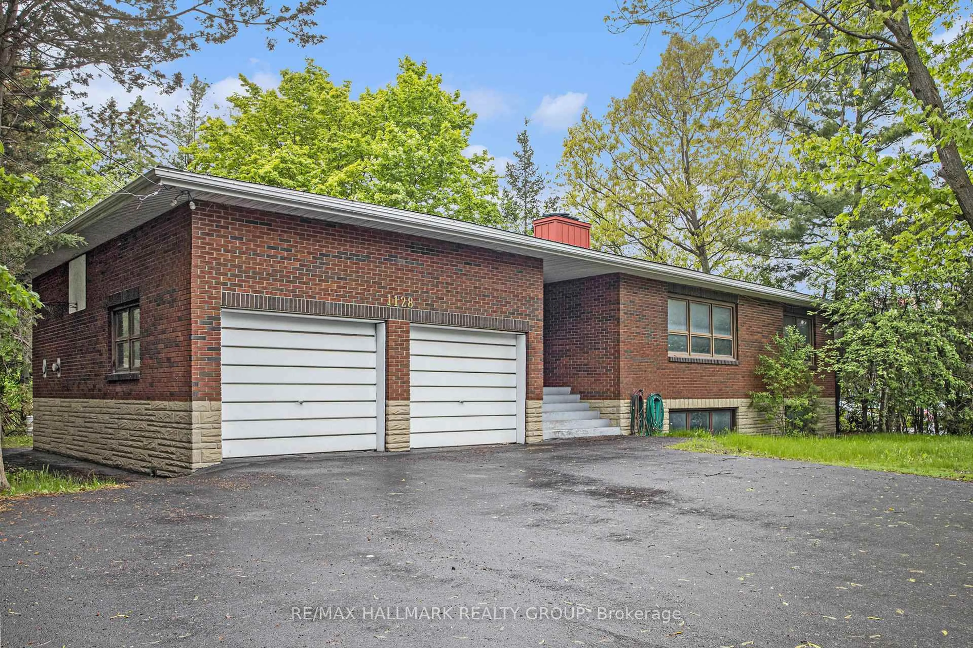 Home with brick exterior material, street for 1128 Cummings Ave, Ottawa Ontario K1J 7R8