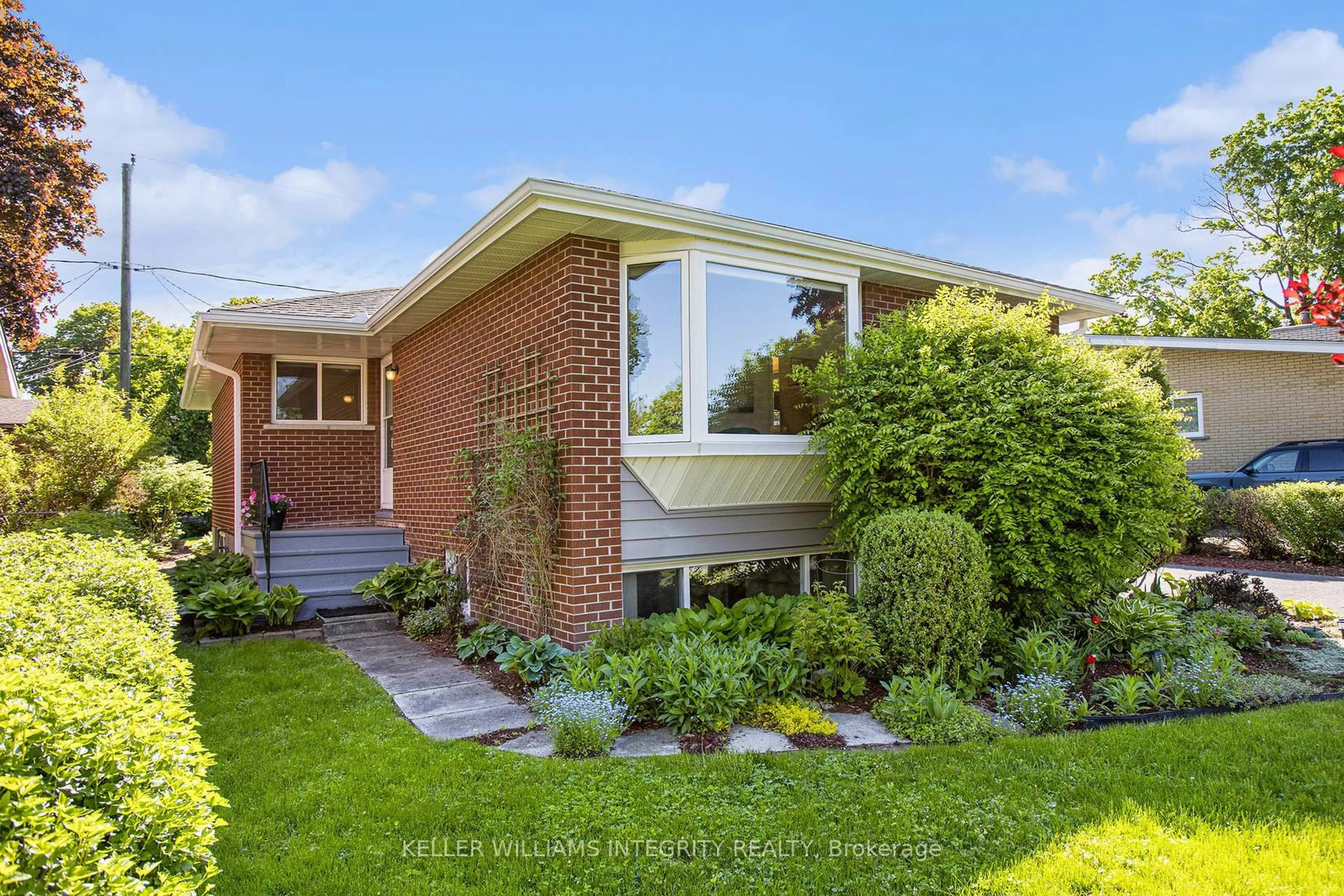 Home with brick exterior material, street for 1315 Agincourt Rd, Ottawa Ontario K2C 2J3