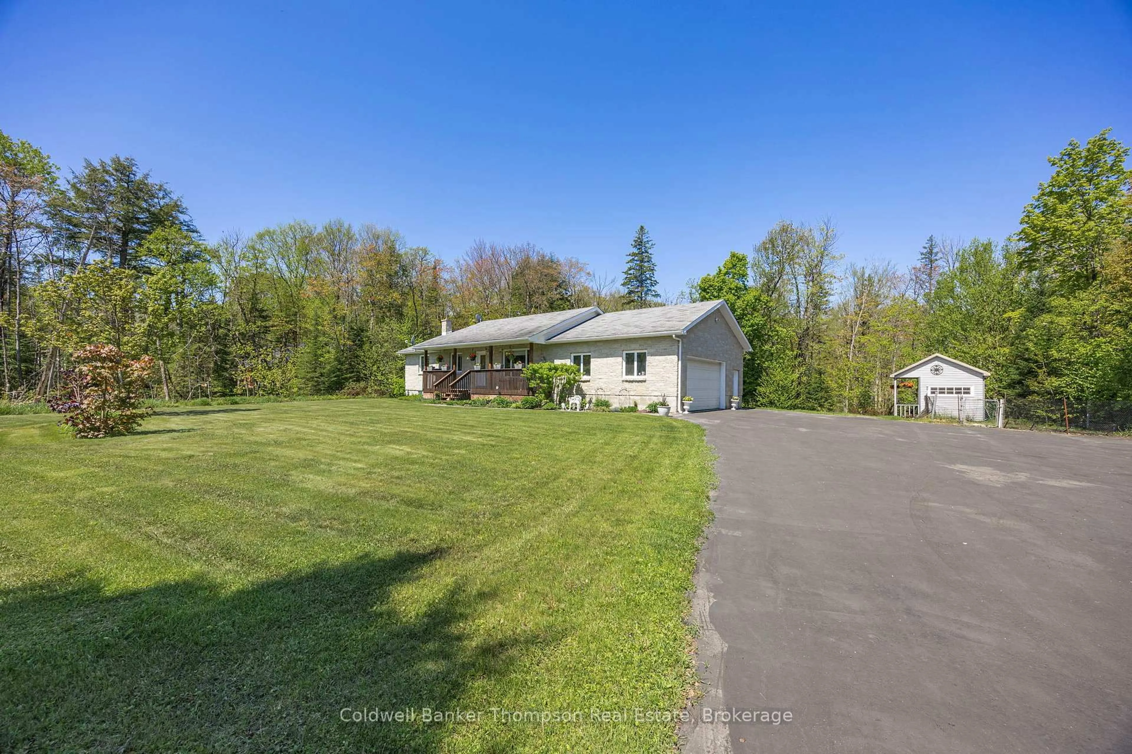 A pic from outside/outdoor area/front of a property/back of a property/a pic from drone, water/lake/river/ocean view for 1170 Old Muskoka Rd, Huntsville Ontario P0B 1M0