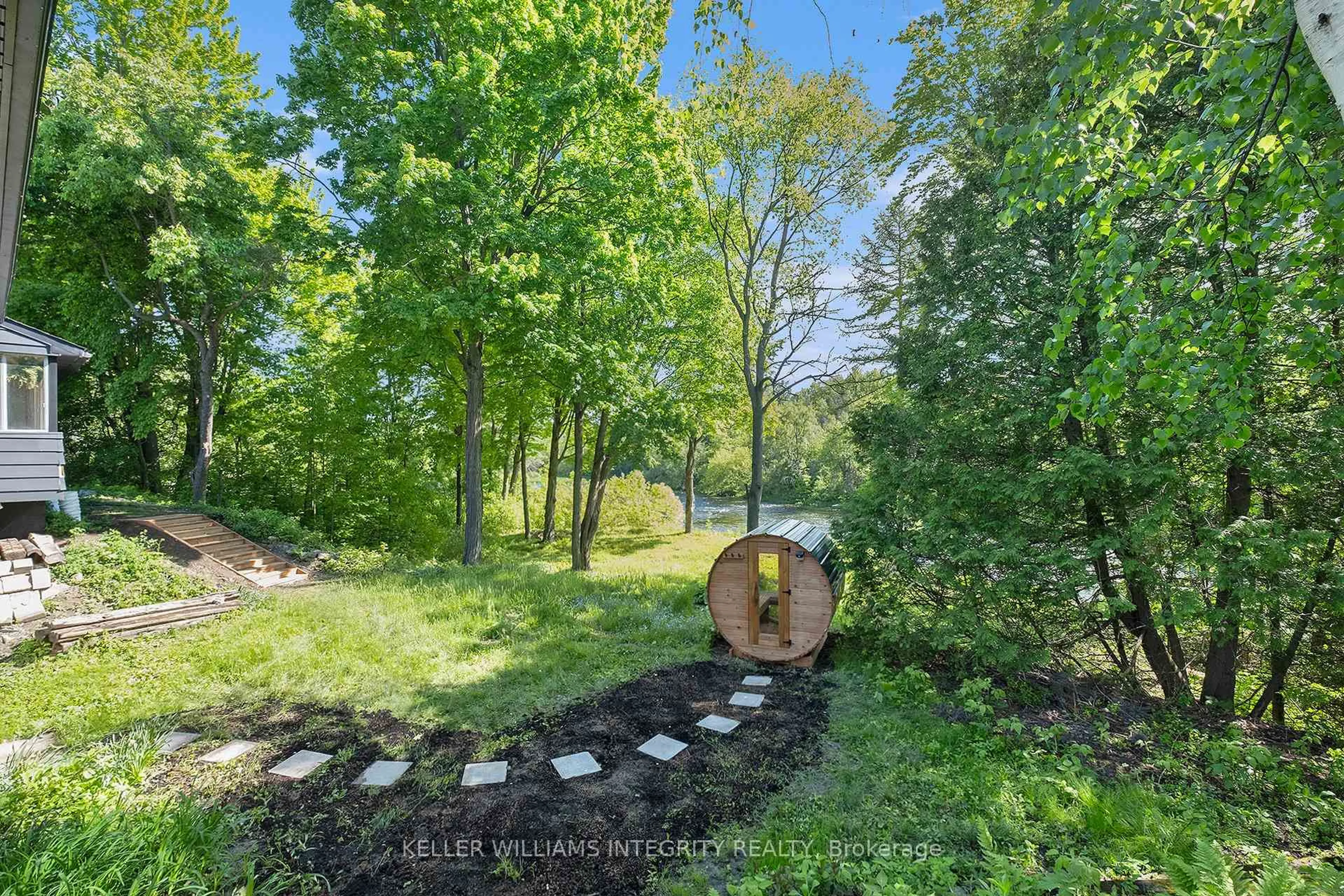 A pic from outside/outdoor area/front of a property/back of a property/a pic from drone, forest/trees view for 17 Lockview Rd, Ottawa Ontario K4M 1B2