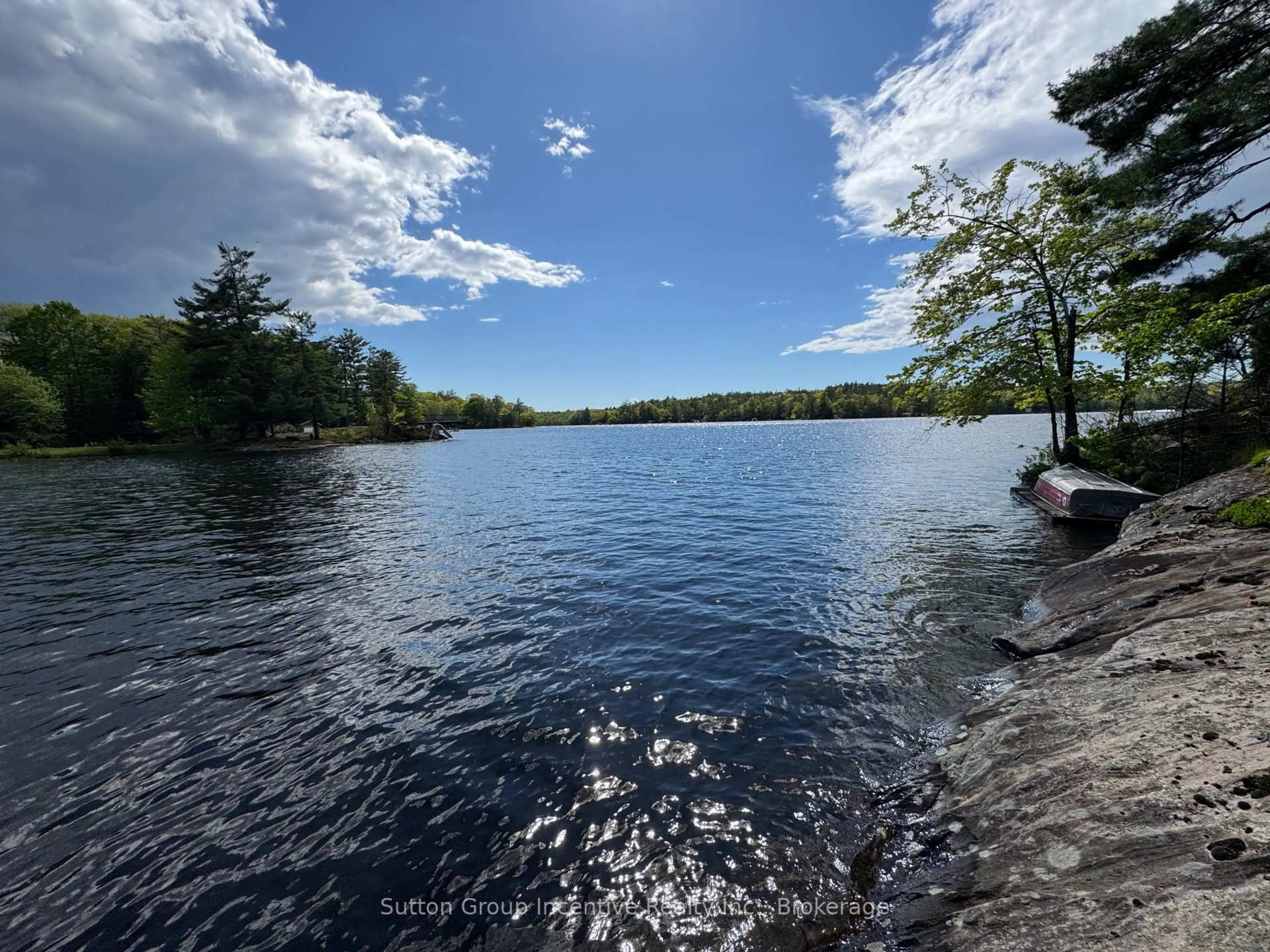 A pic from outside/outdoor area/front of a property/back of a property/a pic from drone, water/lake/river/ocean view for 1017 Goldfinch Crt, Gravenhurst Ontario P0E 1G0