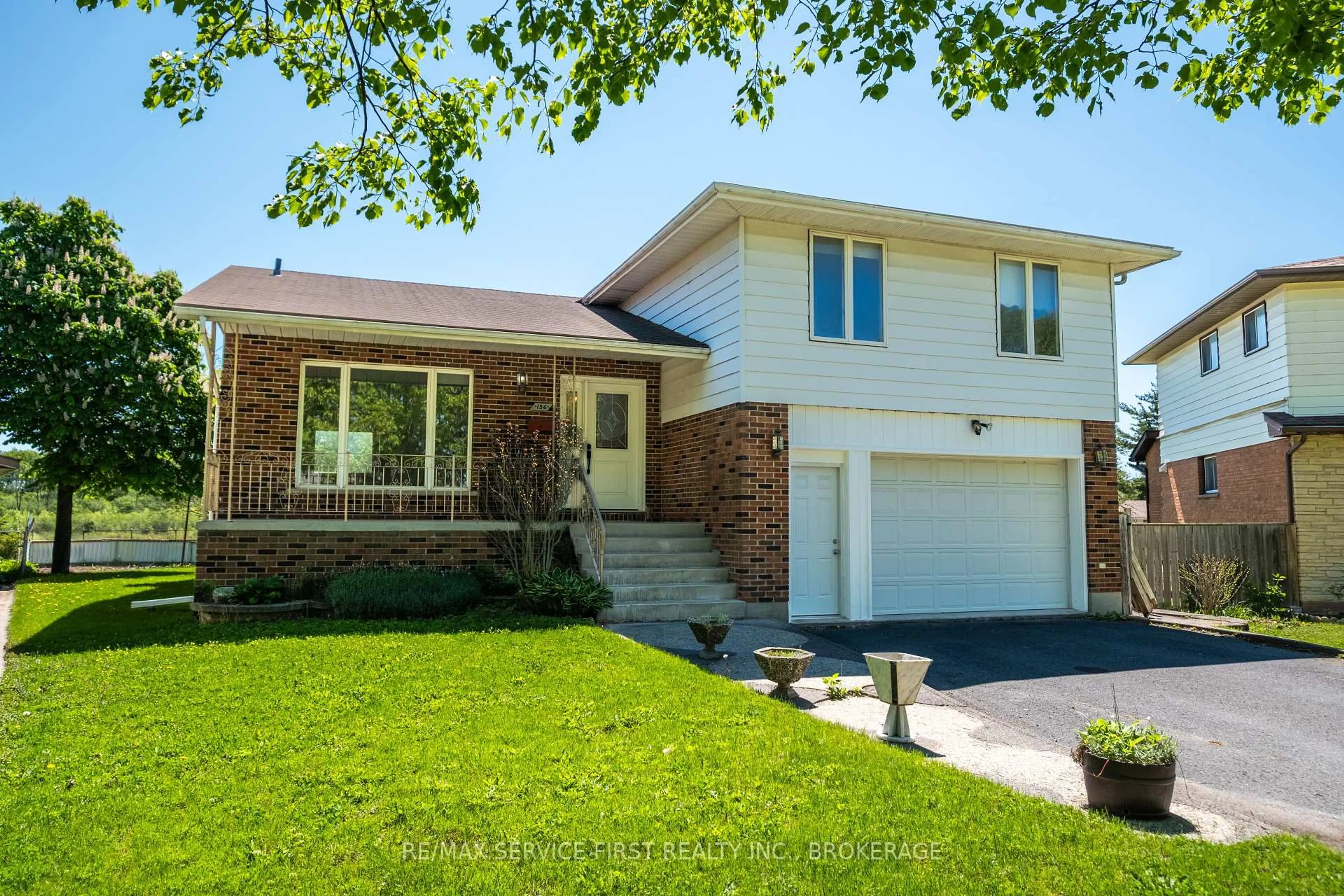 Home with brick exterior material, street for 156 Inverness Cres, Kingston Ontario K7M 6N7