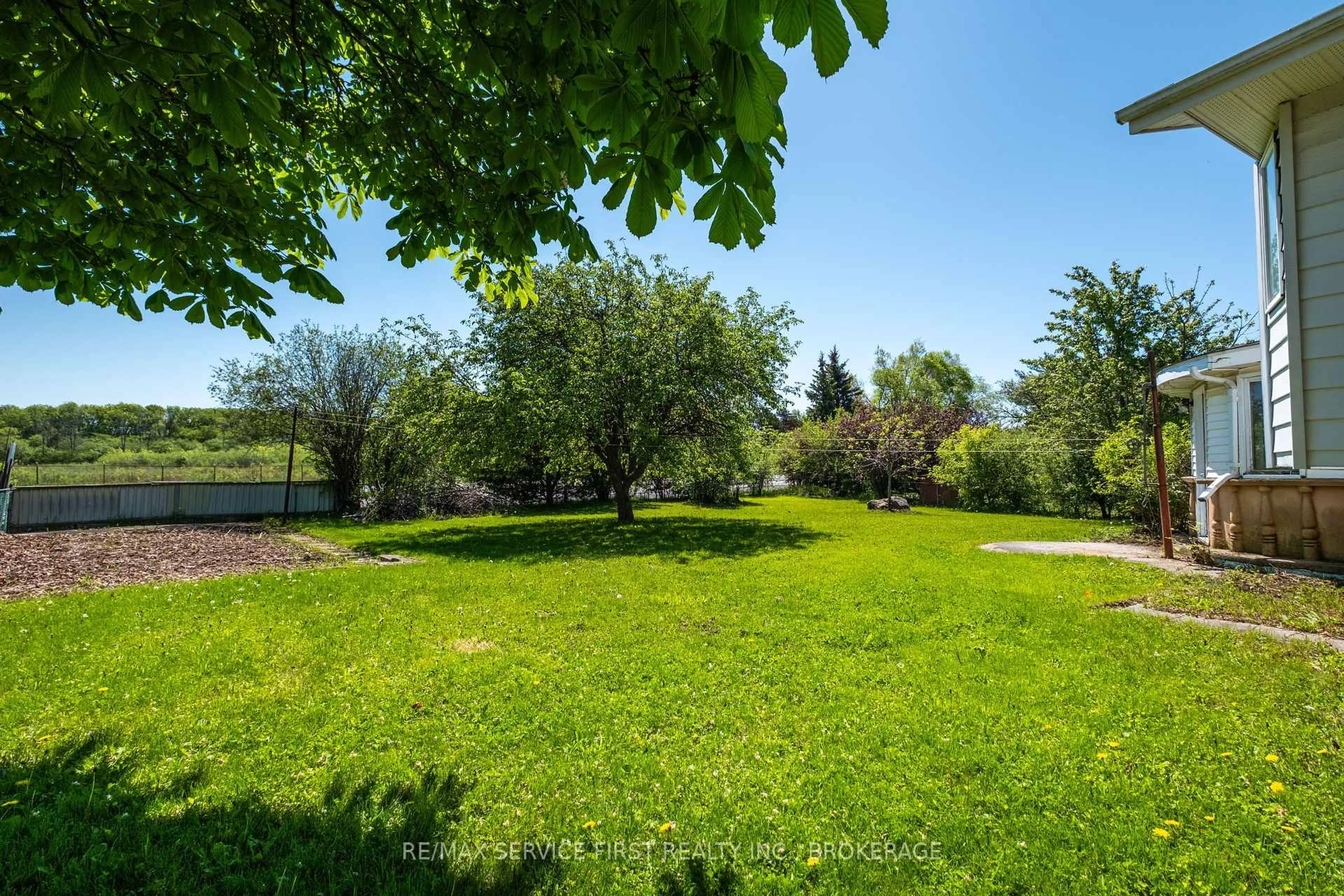 Patio, forest/trees view for 156 Inverness Cres, Kingston Ontario K7M 6N7