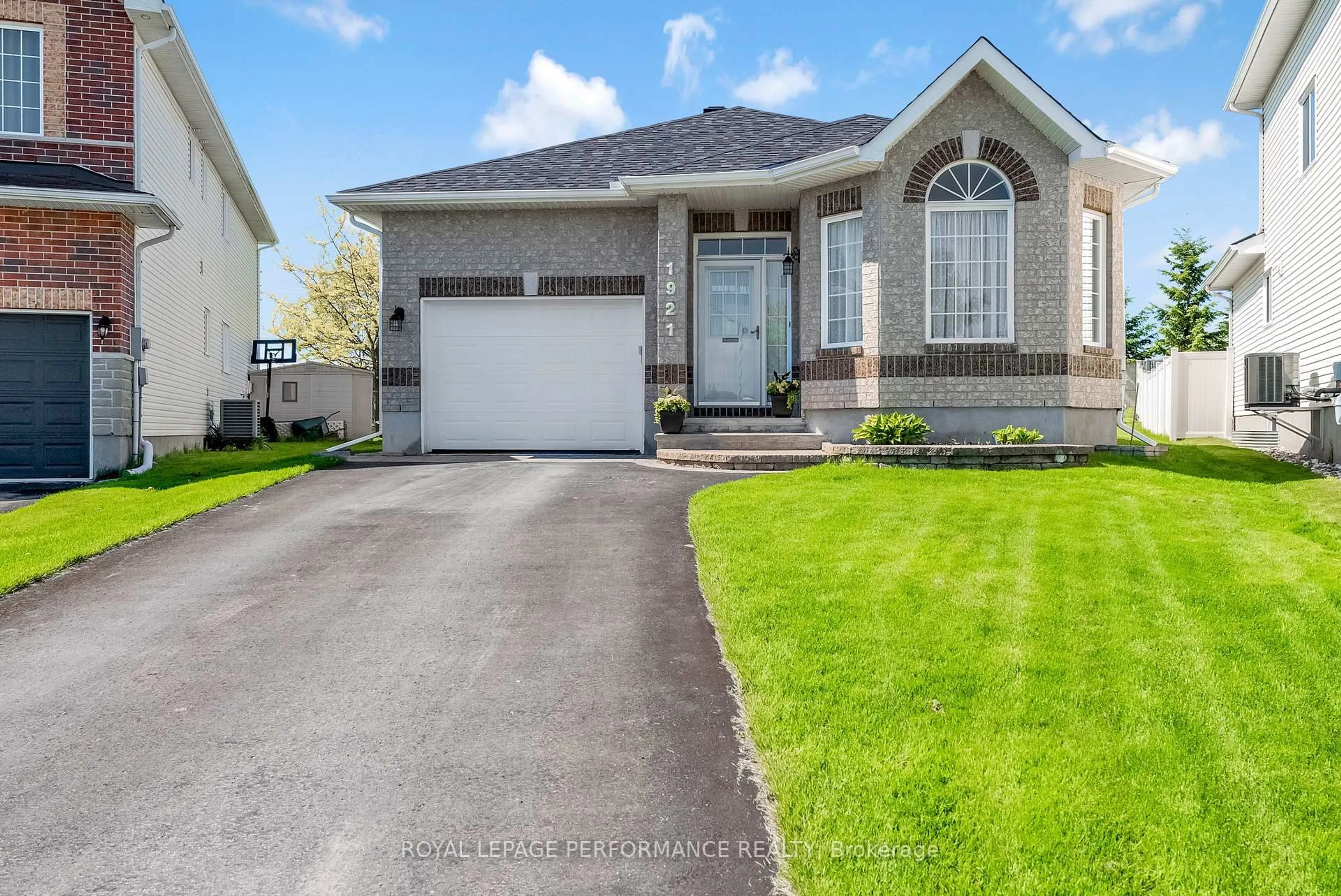 Home with vinyl exterior material, street for 1921 Schroeder Cres, Ottawa Ontario K4A 4P8