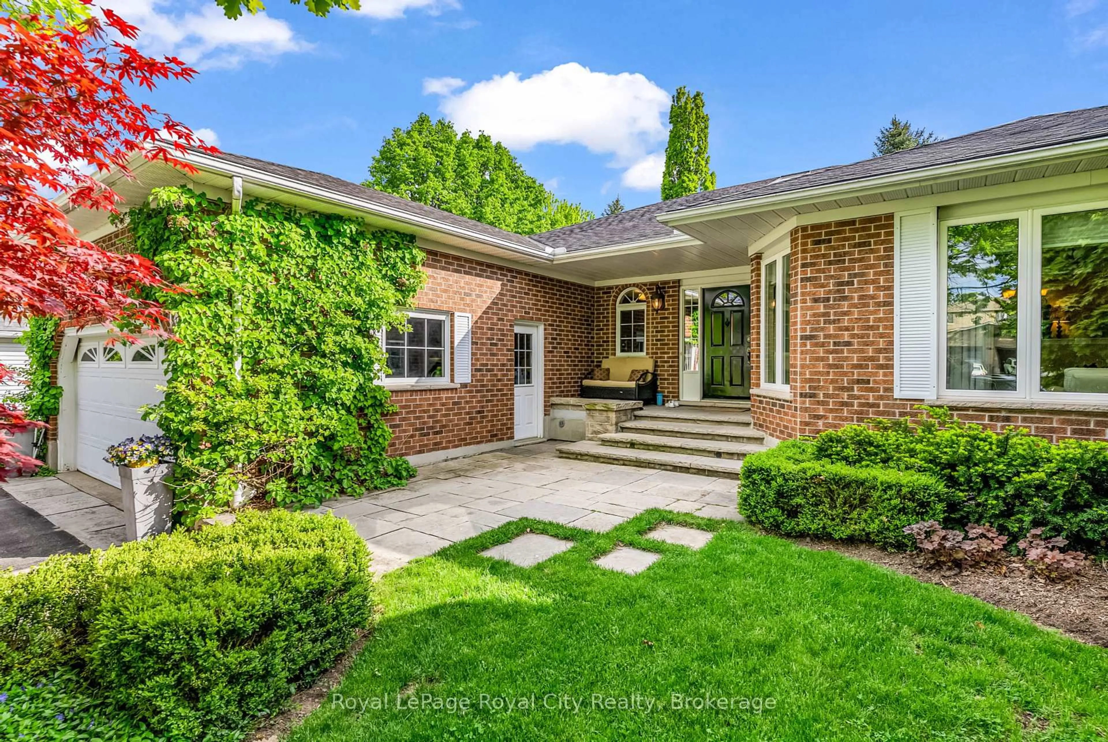 Home with brick exterior material, street for 12 Wood Duck Crt, Guelph Ontario N1C 1B1