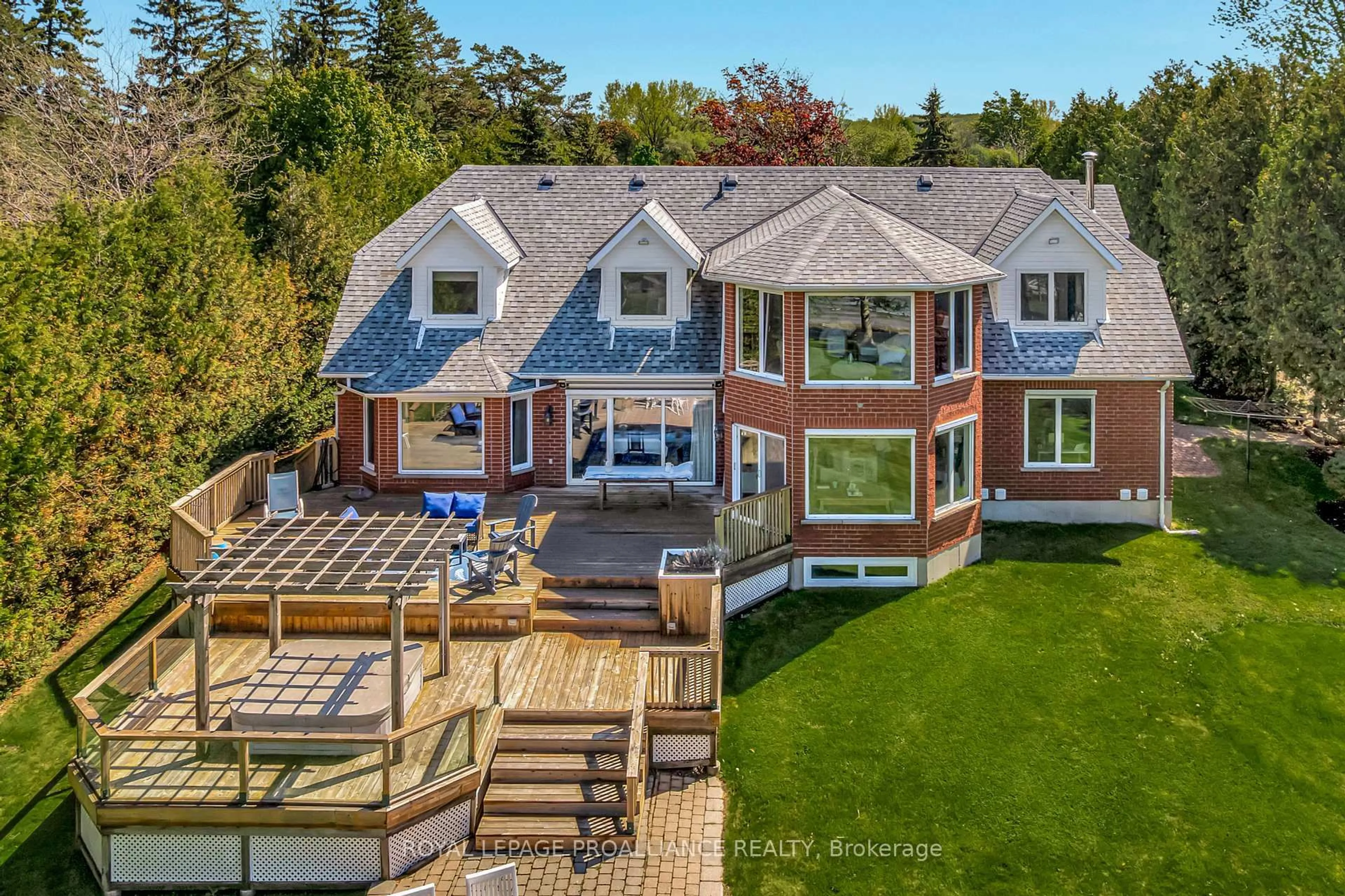 A pic from outside/outdoor area/front of a property/back of a property/a pic from drone, water/lake/river/ocean view for 23 Quigg Lane, Prince Edward County Ontario K0K 1L0