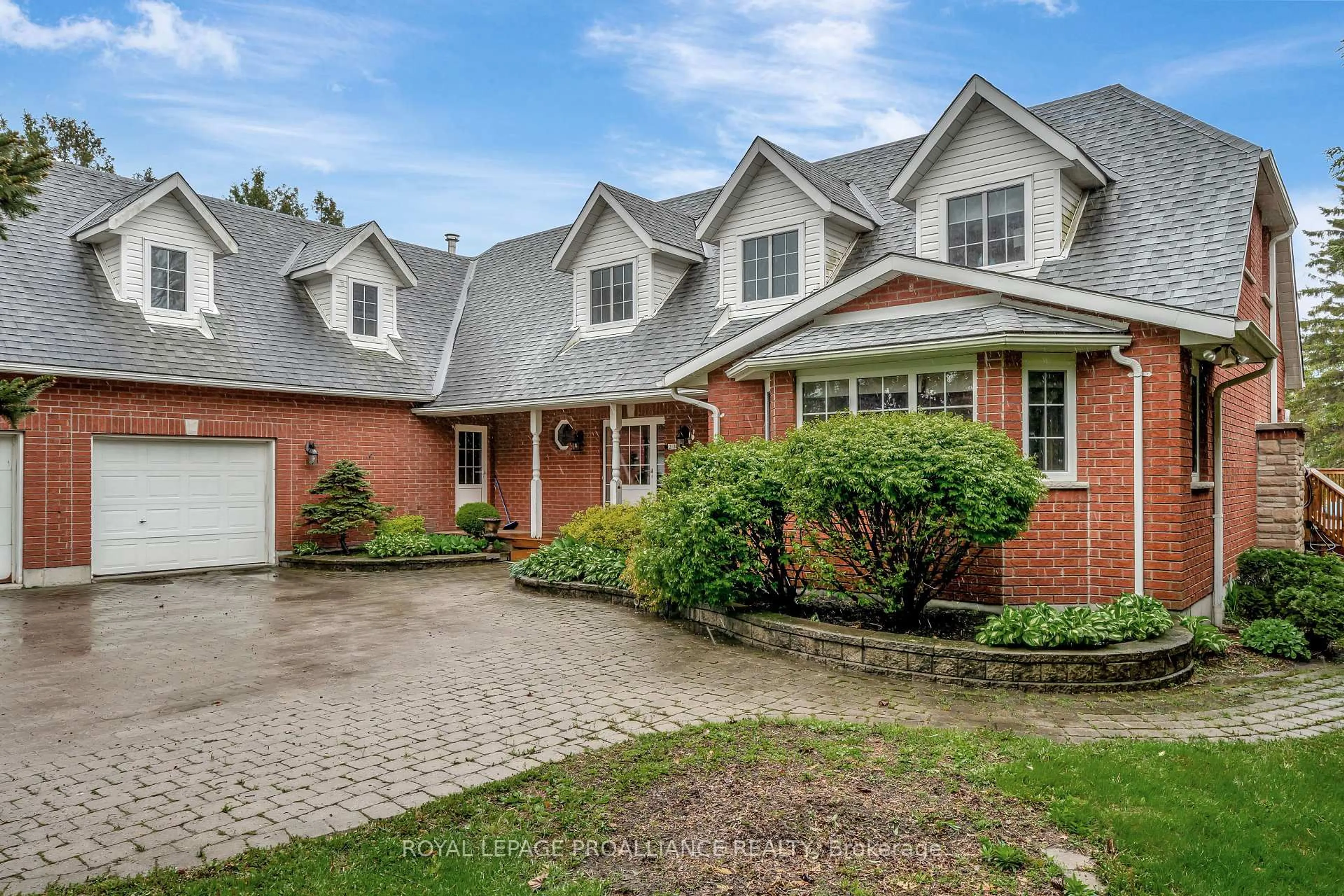 Home with brick exterior material, street for 23 Quigg Lane, Prince Edward County Ontario K0K 1L0