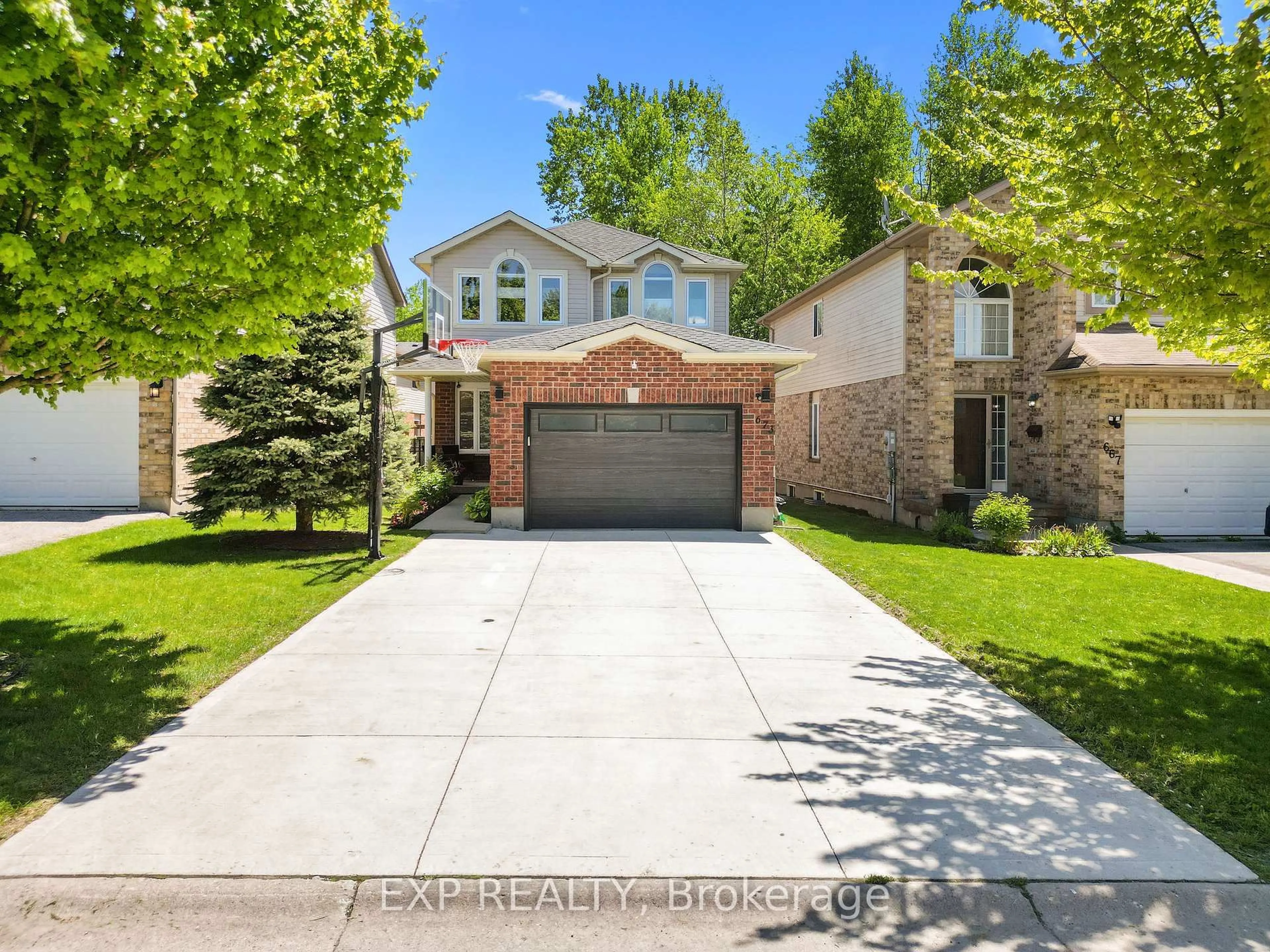 Home with brick exterior material, street for 673 SPRUCEWOOD Dr, London North Ontario N5X 4L5