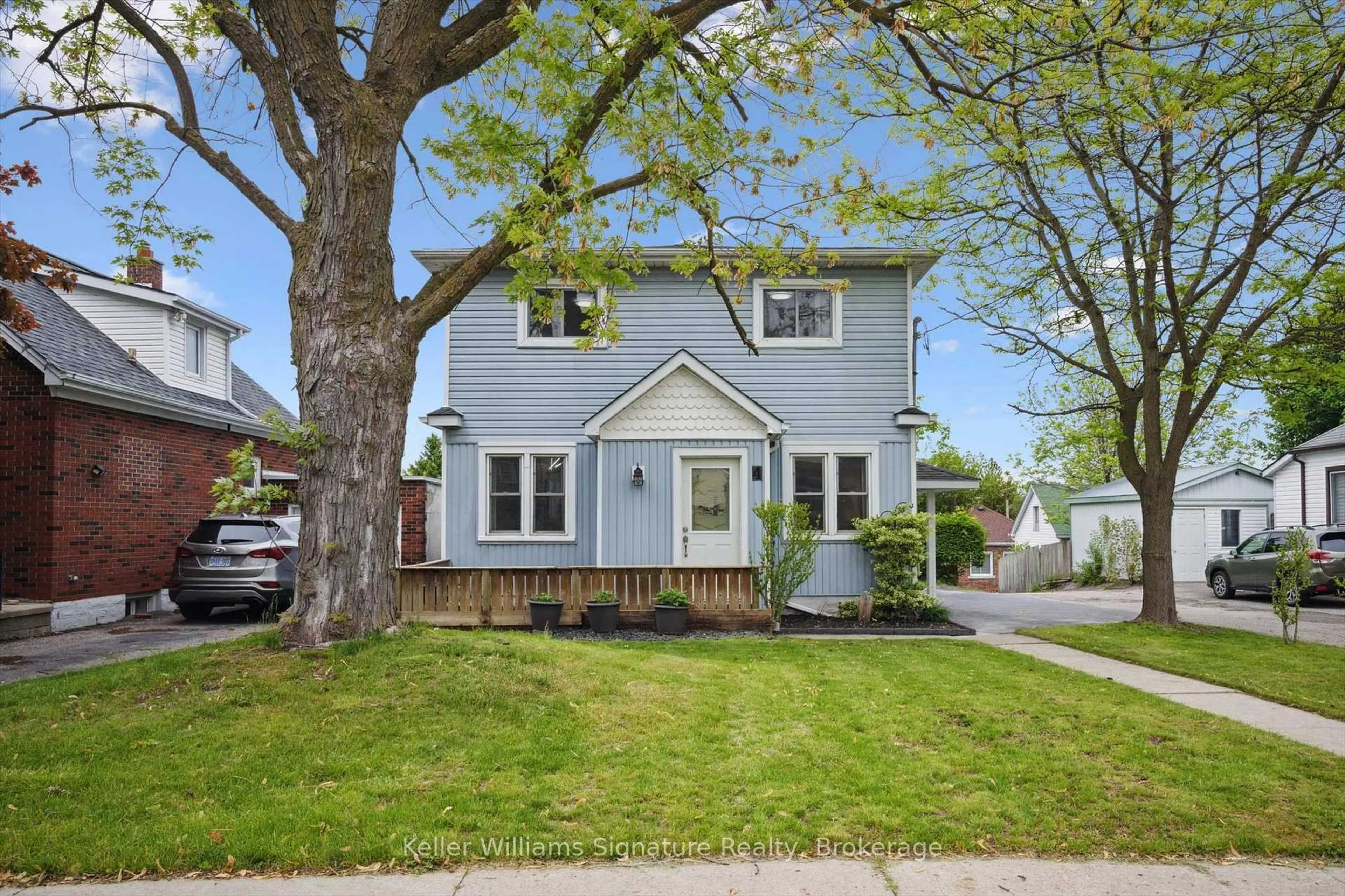 Home with vinyl exterior material, street for 4 Kennedy Ave, Kitchener Ontario N2G 2Z8