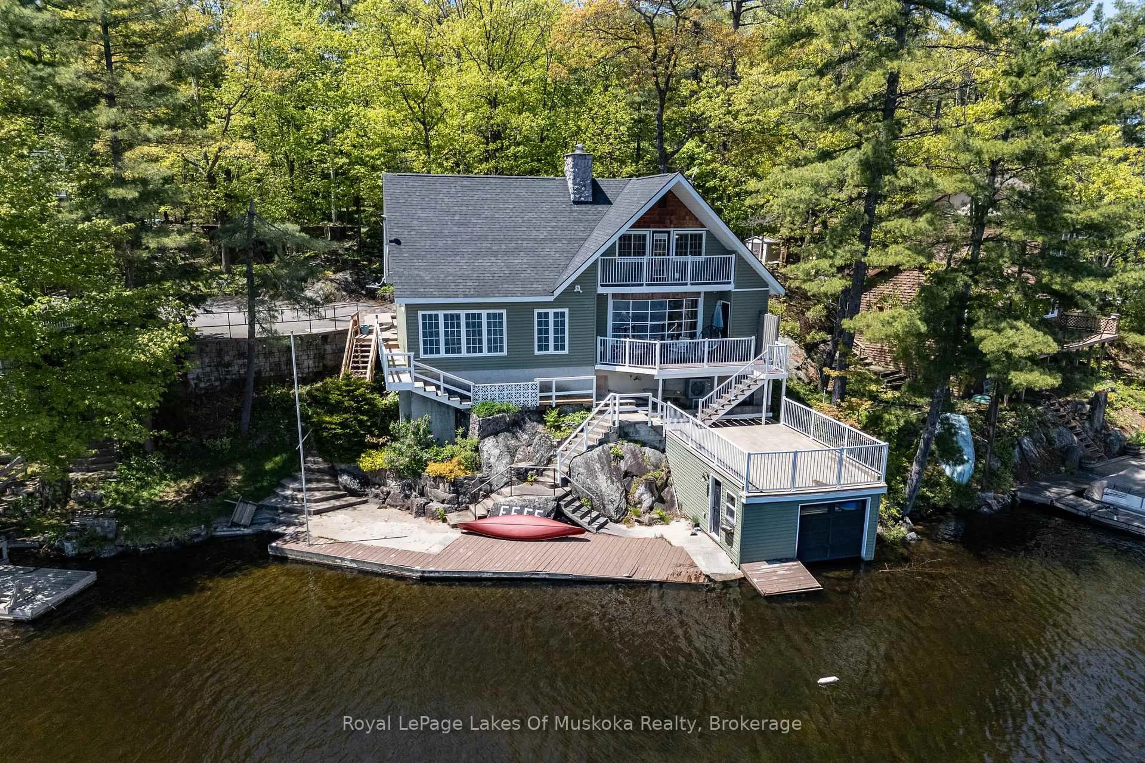 A pic from outside/outdoor area/front of a property/back of a property/a pic from drone, water/lake/river/ocean view for 4-1010 Pinedale Rd, Gravenhurst Ontario P1P 1T7