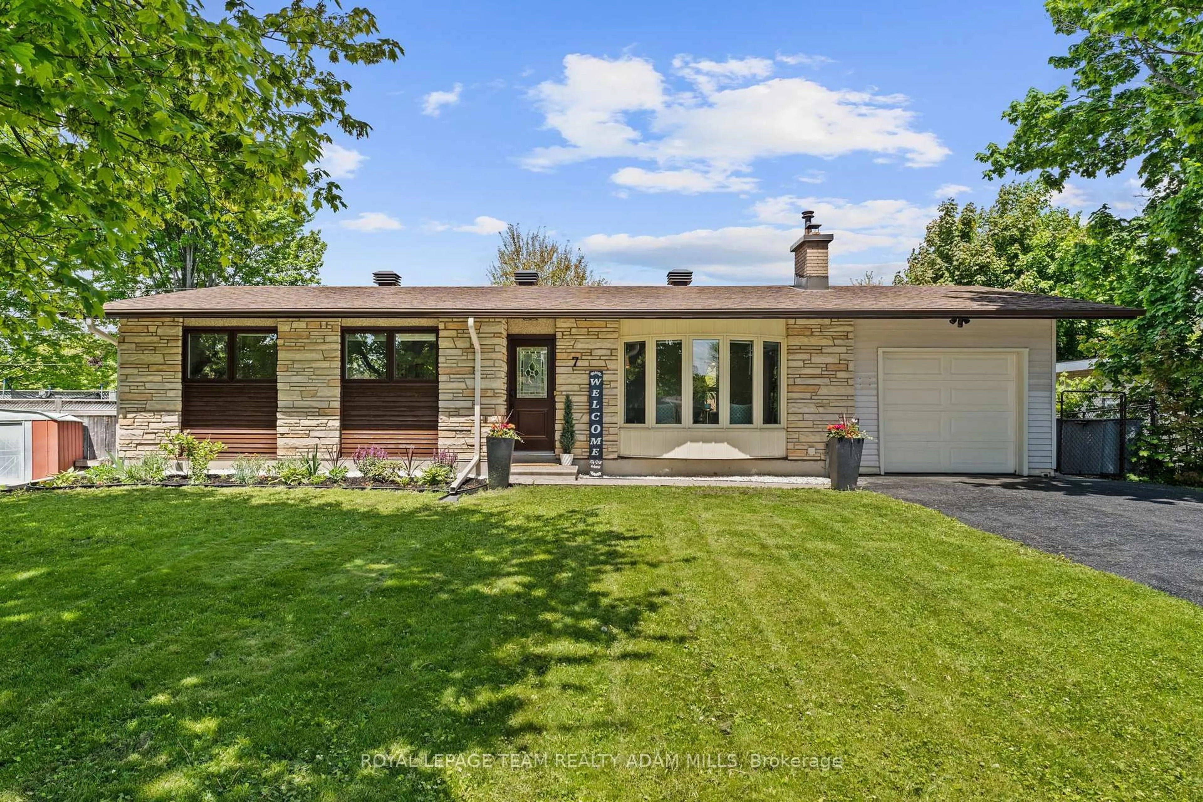 Home with brick exterior material, street for 7 Elterwater Ave, Ottawa Ontario K2H 5J1