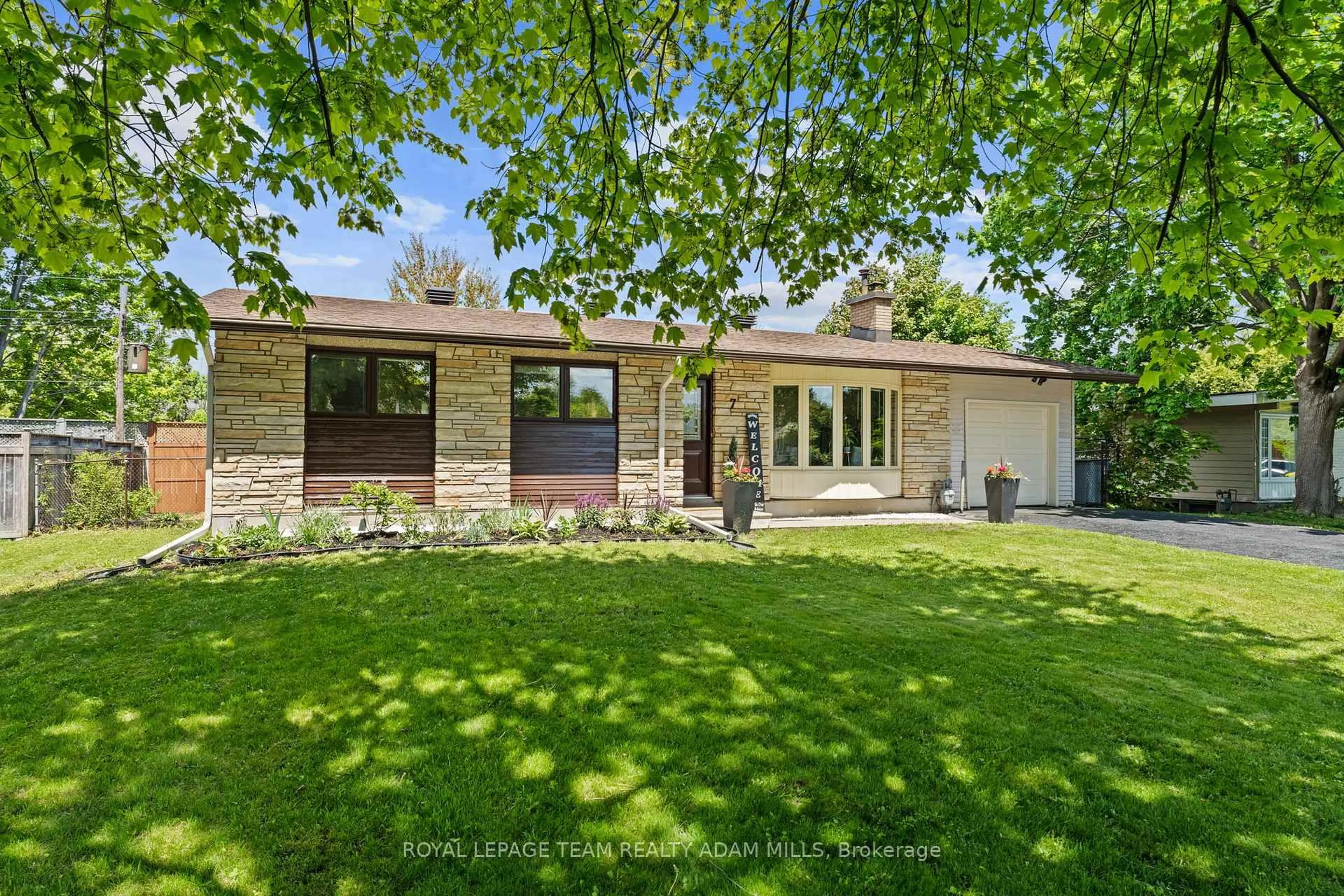 Home with brick exterior material, street for 7 Elterwater Ave, Ottawa Ontario K2H 5J1