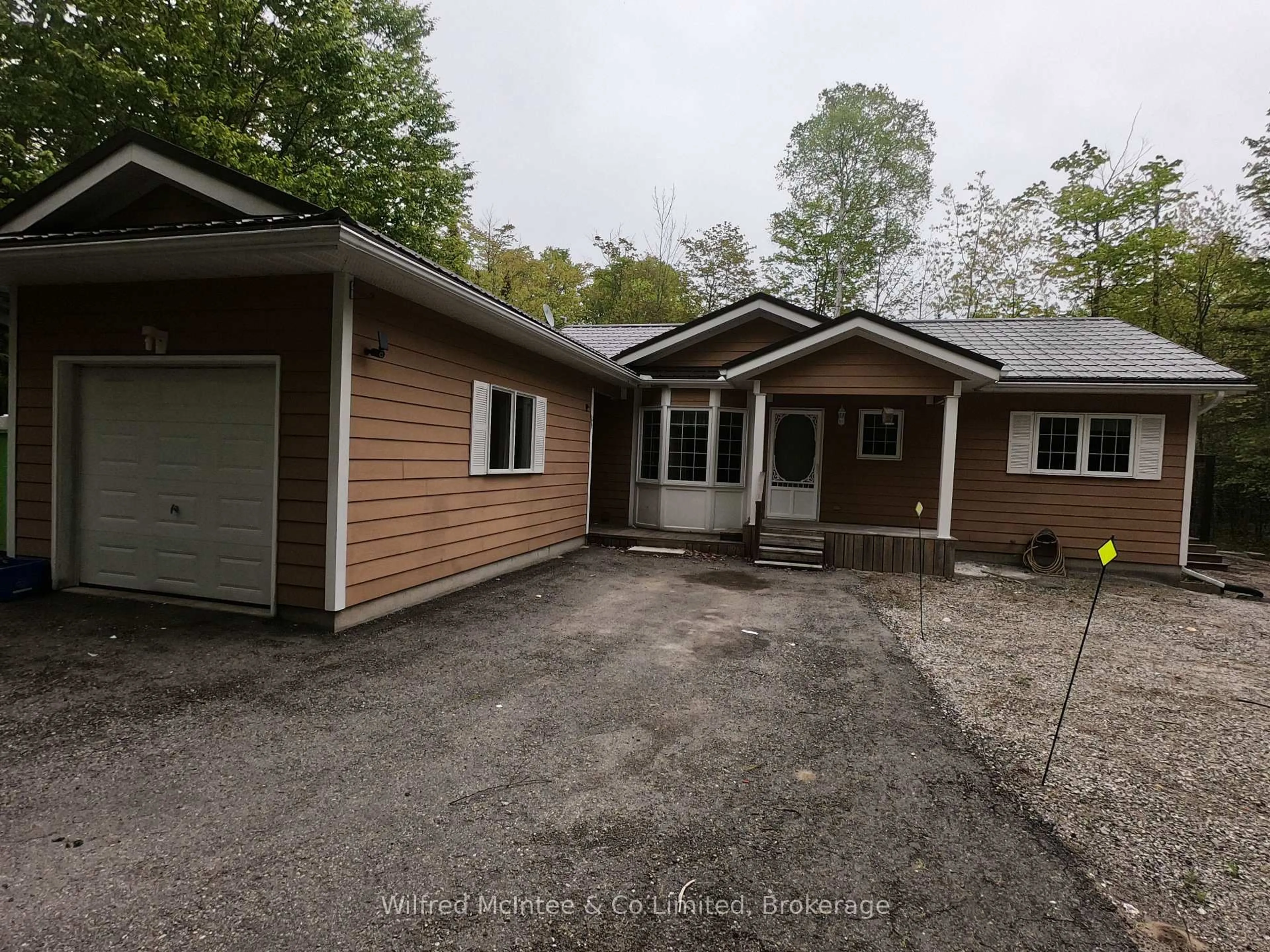 A pic from outside/outdoor area/front of a property/back of a property/a pic from drone, unknown for 49 Beechwood Dr, South Bruce Peninsula Ontario N0H 2G0