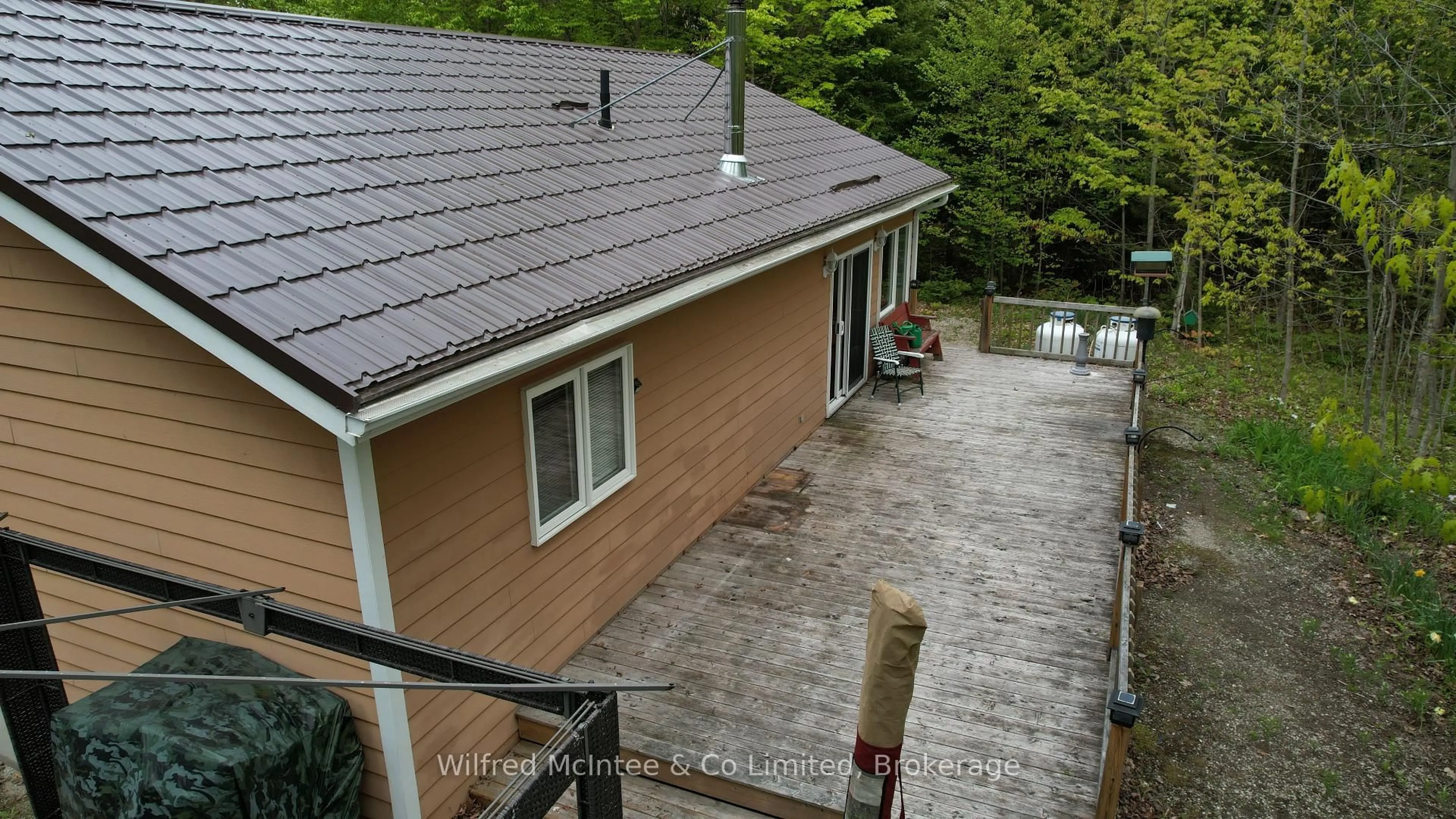 A pic from outside/outdoor area/front of a property/back of a property/a pic from drone, unknown for 49 Beechwood Dr, South Bruce Peninsula Ontario N0H 2G0