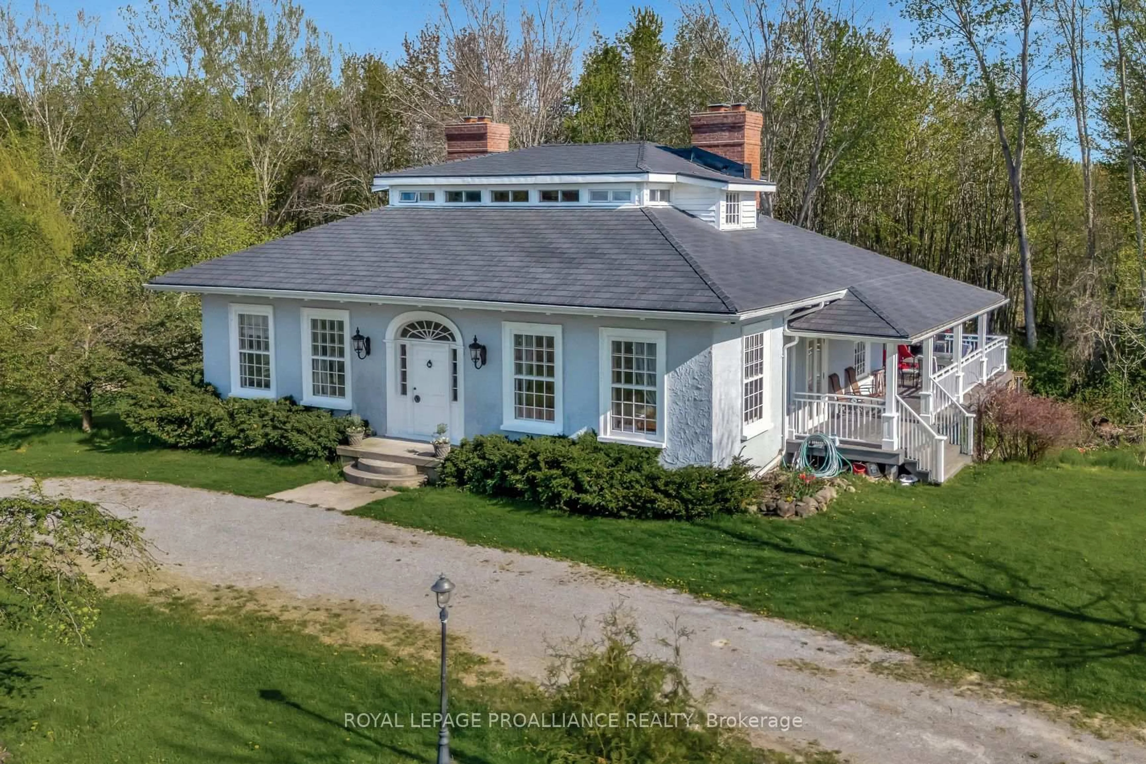 A pic from outside/outdoor area/front of a property/back of a property/a pic from drone, street for 1479 Lakeside Dr, Prince Edward County Ontario K0K 2T0