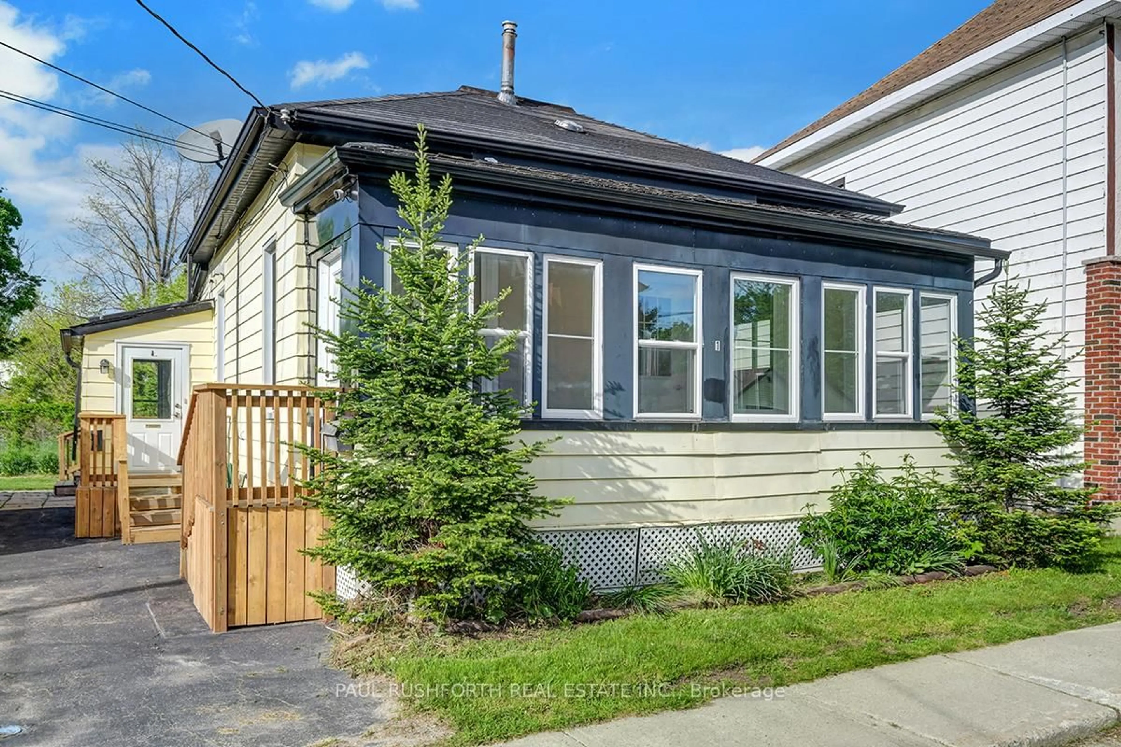 Home with vinyl exterior material, street for 1 Winnifred St, Smiths Falls Ontario K7A 2M7