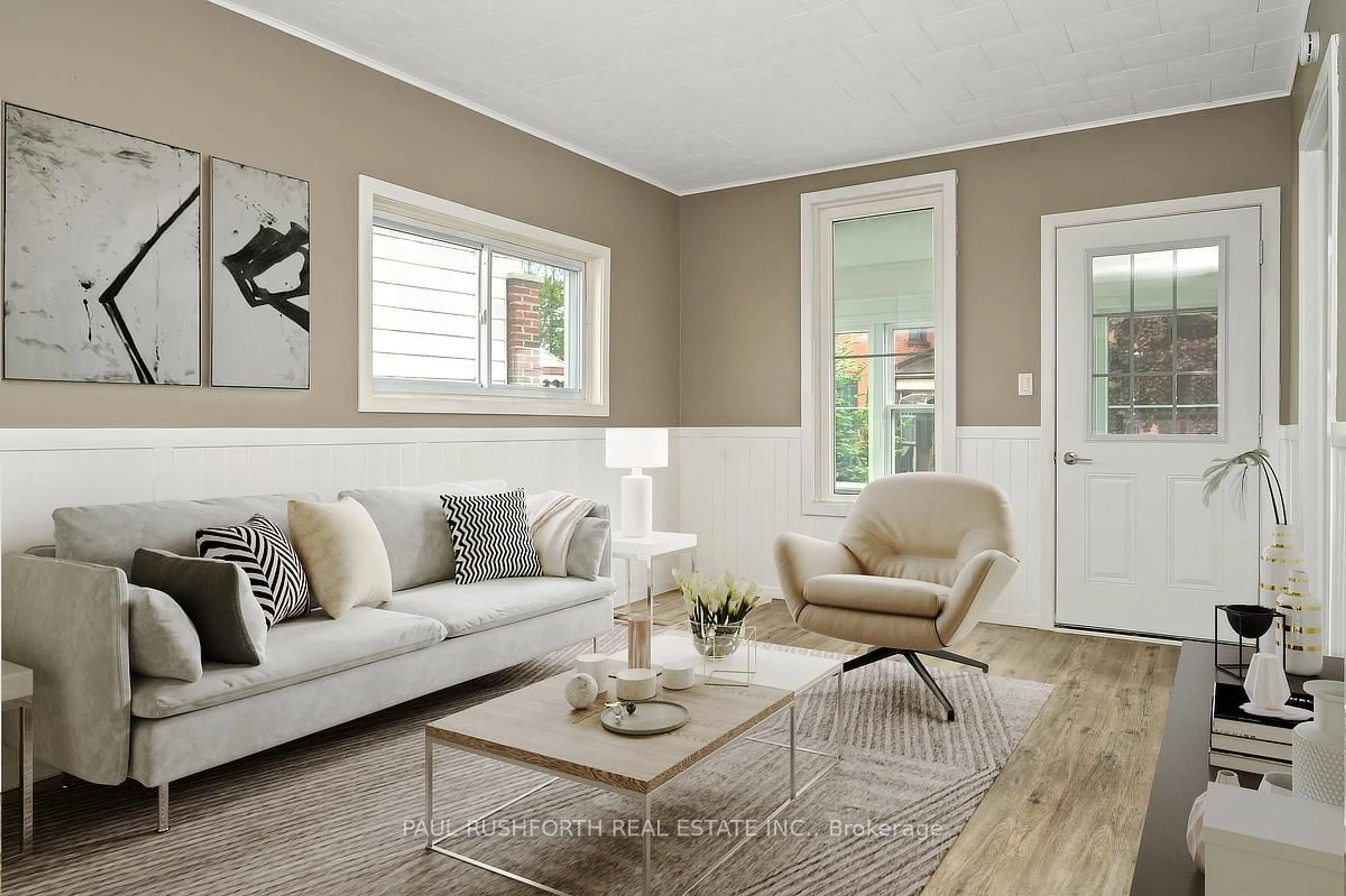 Living room with furniture, wood/laminate floor for 1 Winnifred St, Smiths Falls Ontario K7A 2M7