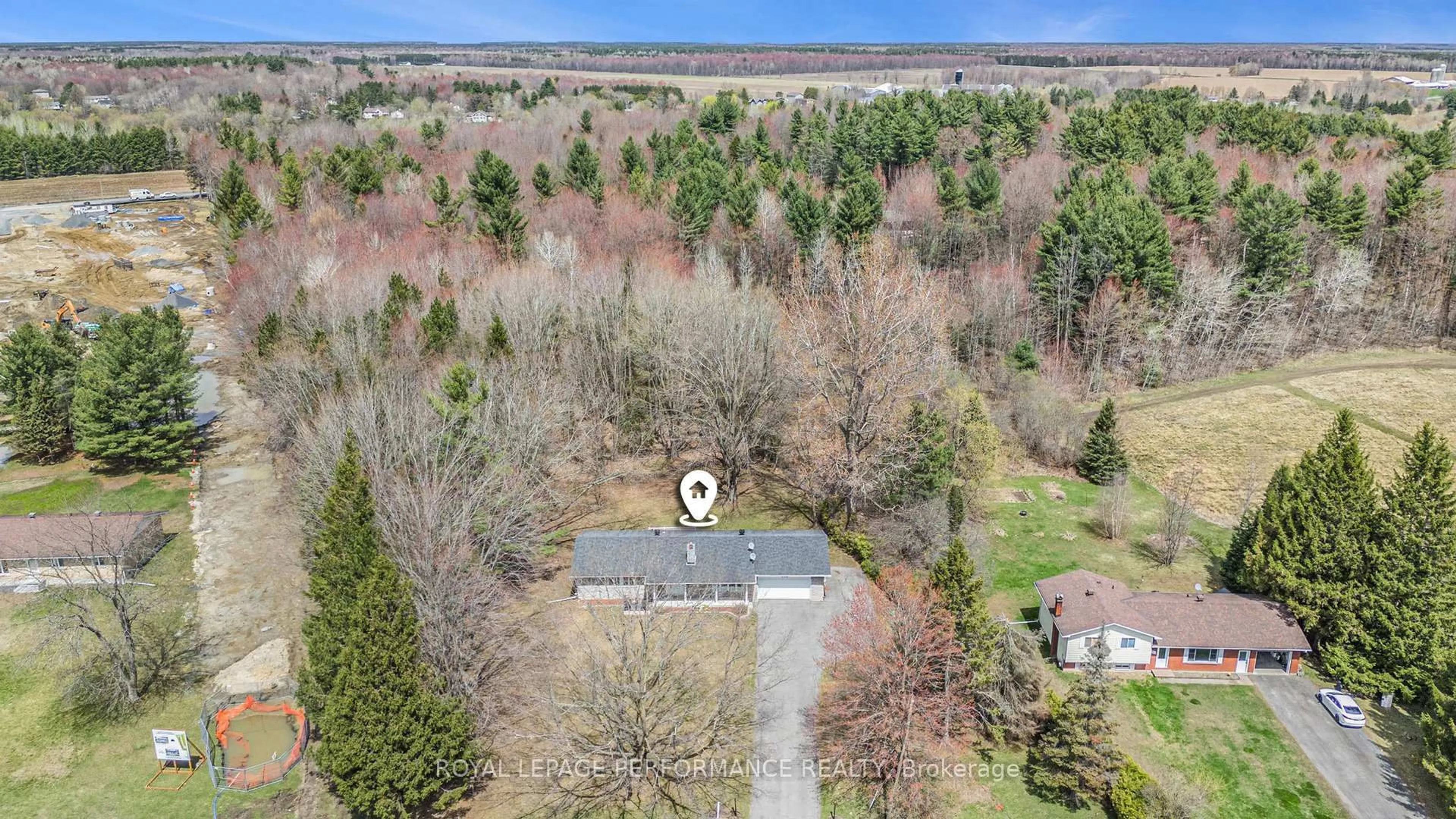 A pic from outside/outdoor area/front of a property/back of a property/a pic from drone, forest/trees view for 862 Principale St, Casselman Ontario K0A 1M0
