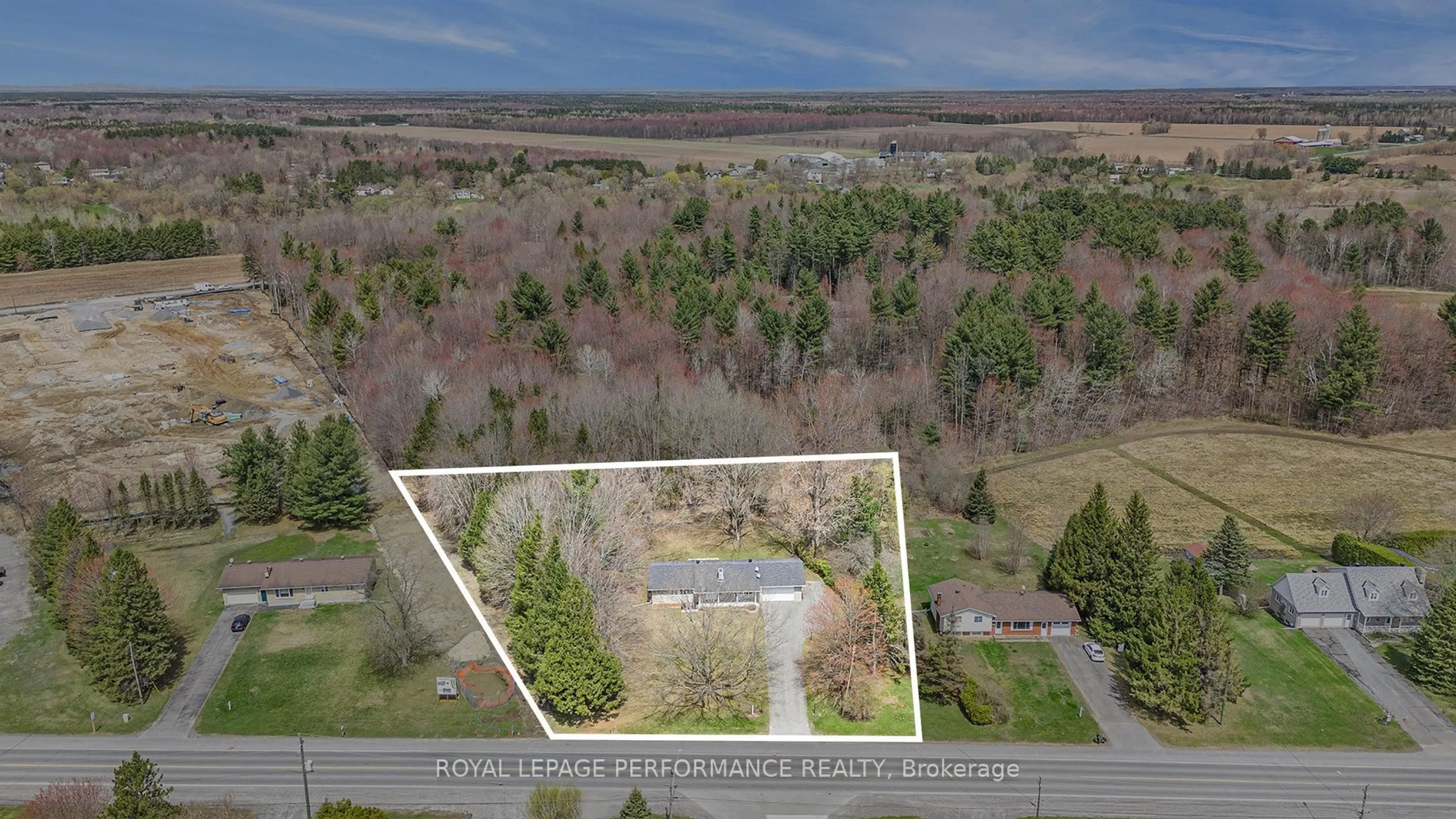 A pic from outside/outdoor area/front of a property/back of a property/a pic from drone, forest/trees view for 862 Principale St, Casselman Ontario K0A 1M0