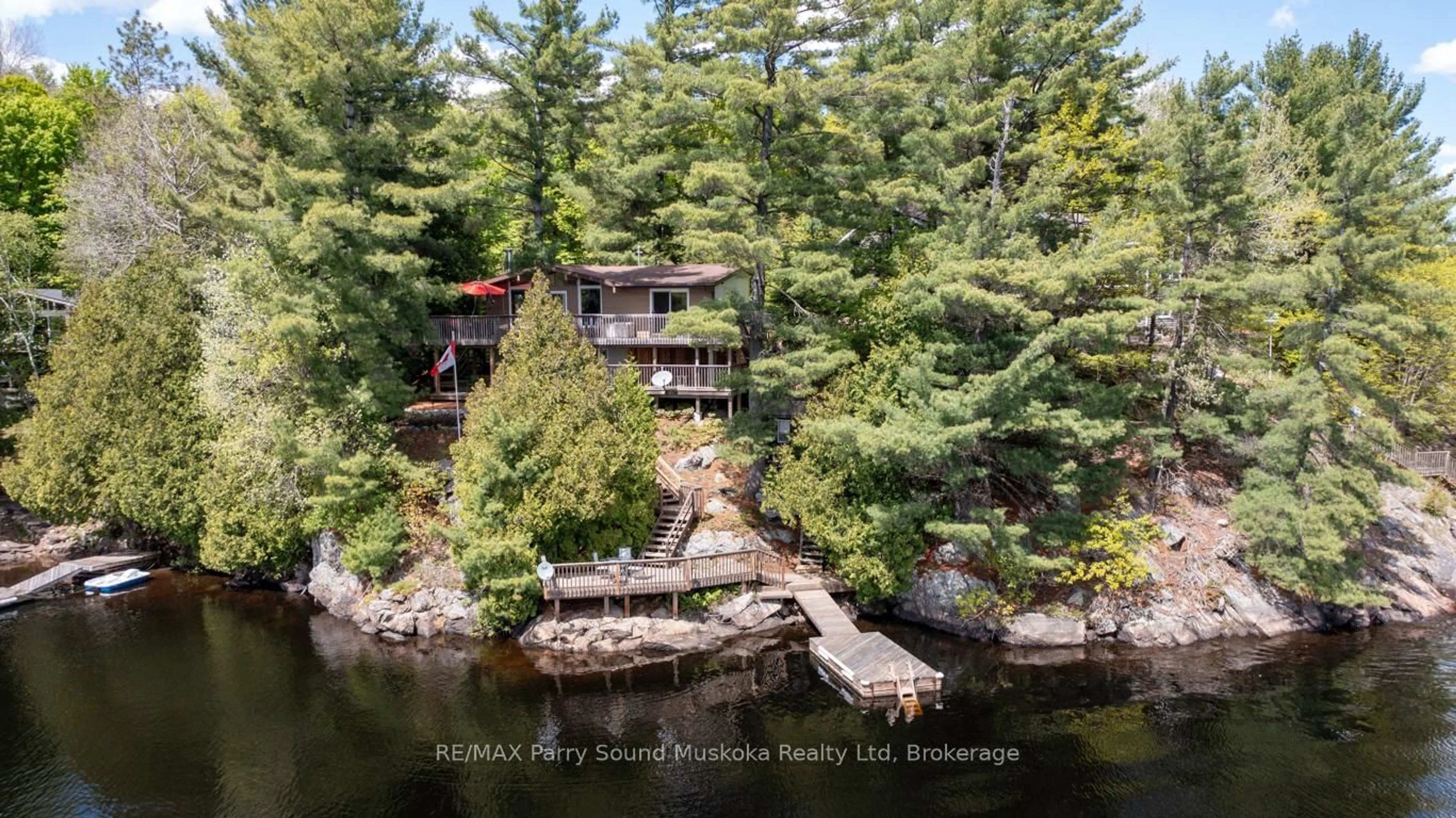 A pic from outside/outdoor area/front of a property/back of a property/a pic from drone, water/lake/river/ocean view for 213 Dunchurch Estates Rd, Whitestone Ontario P0A 1G0