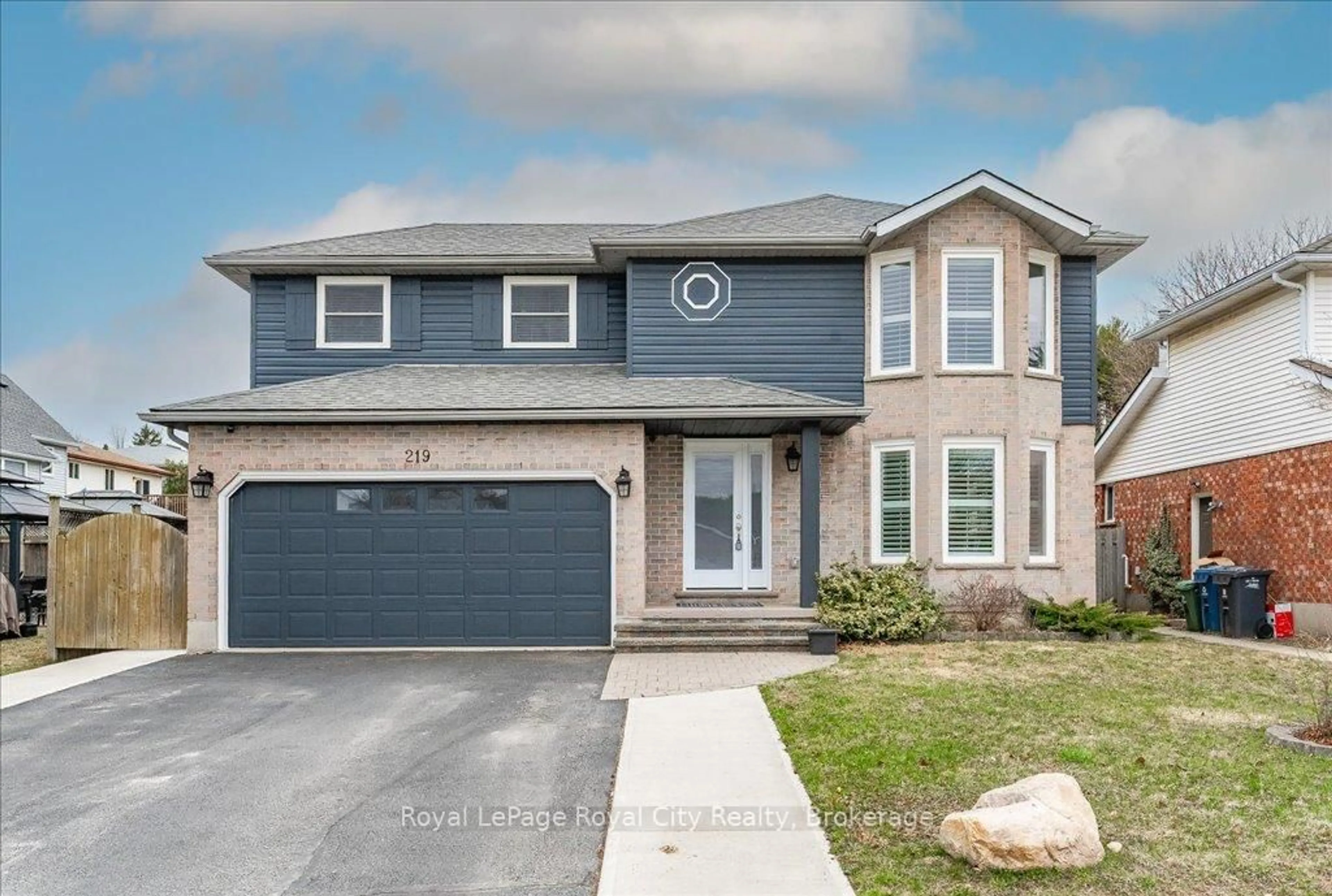 Home with brick exterior material, street for 219 Elmira Rd, Guelph Ontario N1K 1R1