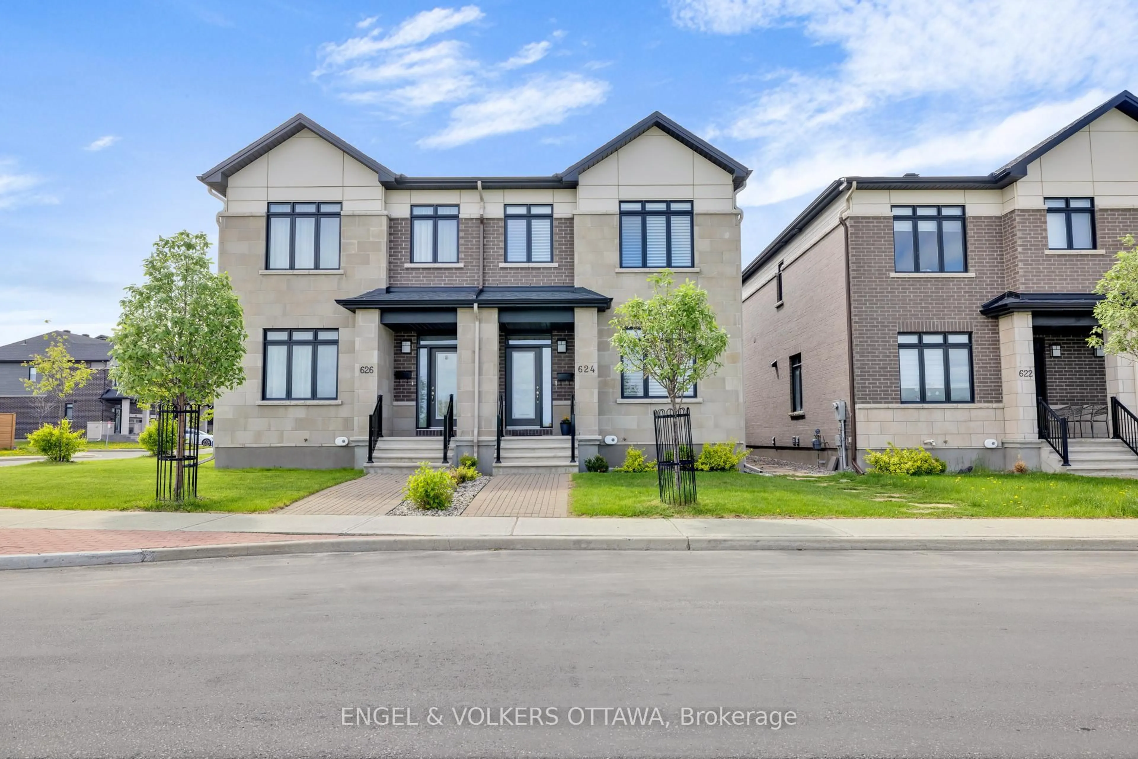 Home with brick exterior material, street for 624 Mikinak Rd, Ottawa Ontario K1K 3X7