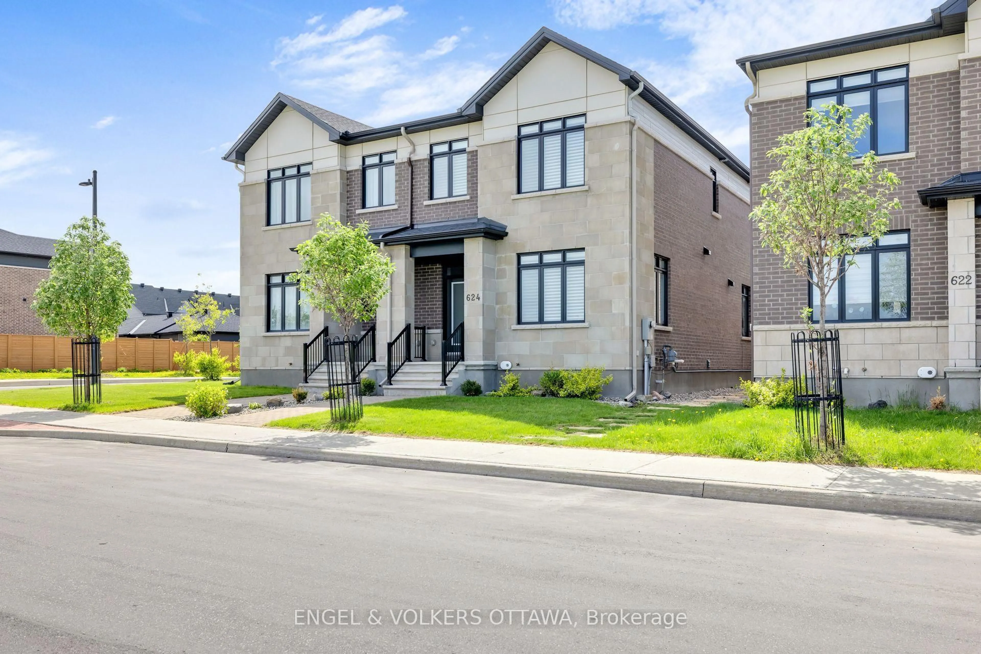 Home with brick exterior material, street for 624 Mikinak Rd, Ottawa Ontario K1K 3X7