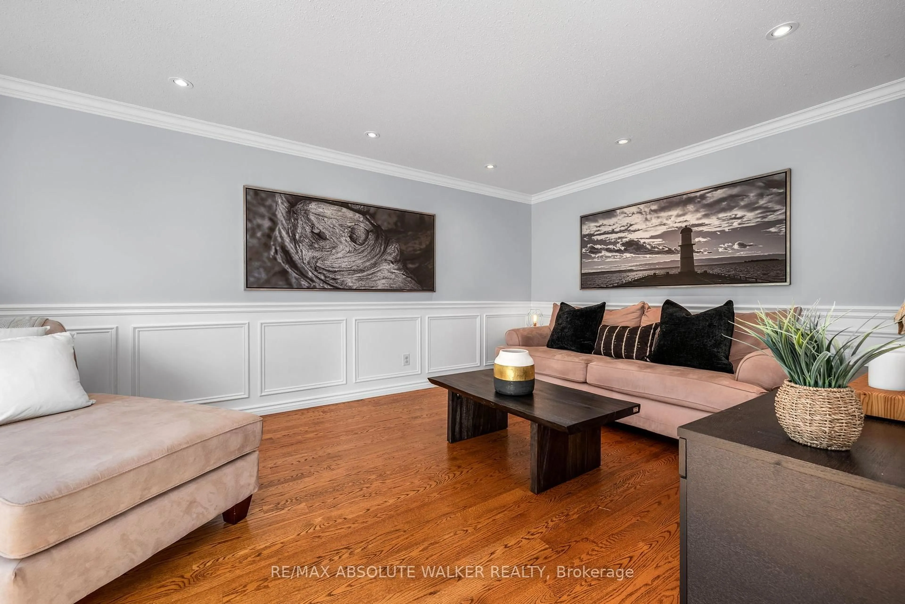 Living room with furniture, wood/laminate floor for 1415 Forest Valley Dr, Ottawa Ontario K1C 5M8
