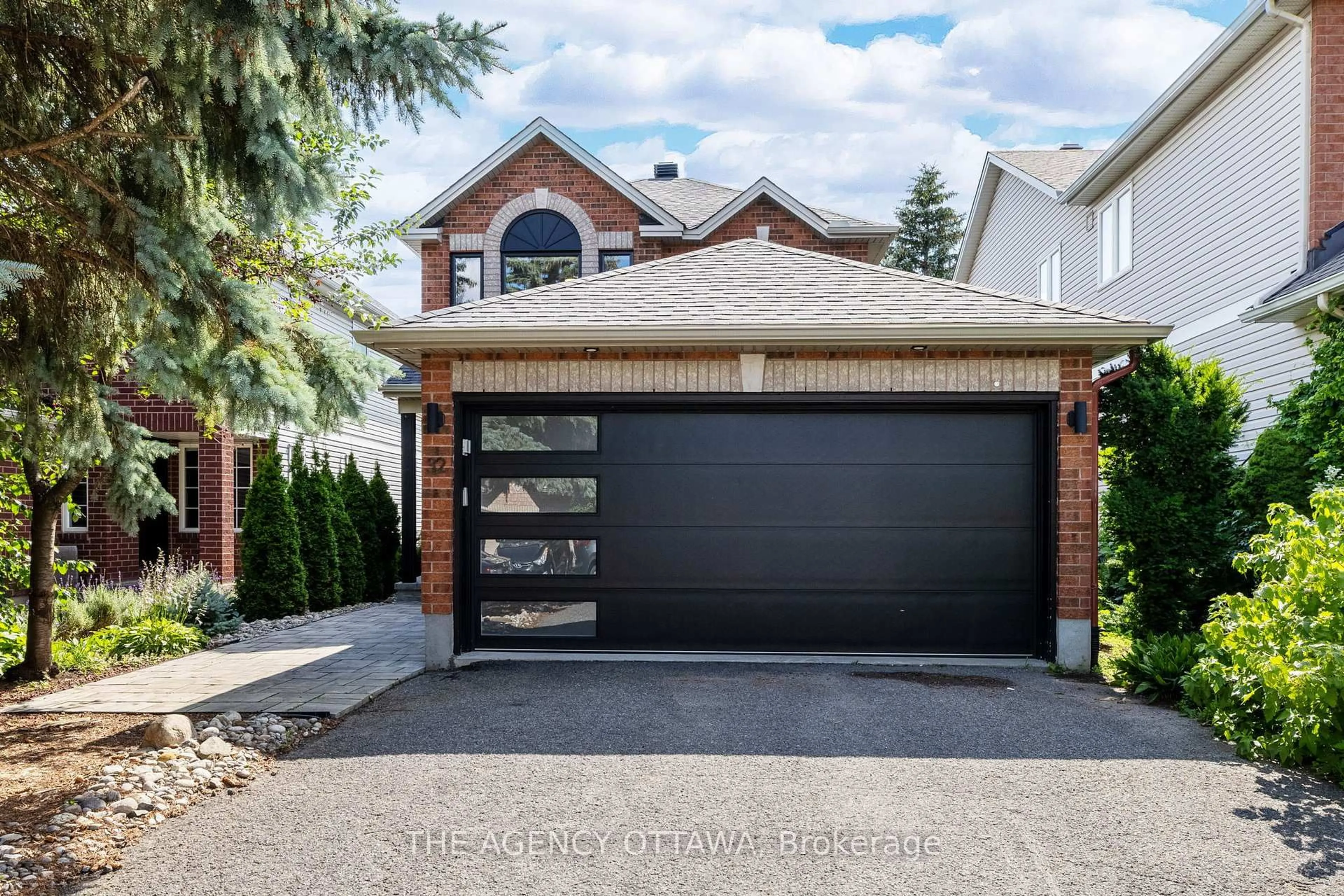 Home with brick exterior material, street for 32 WHITESTONE Dr, Ottawa Ontario K2C 4A9