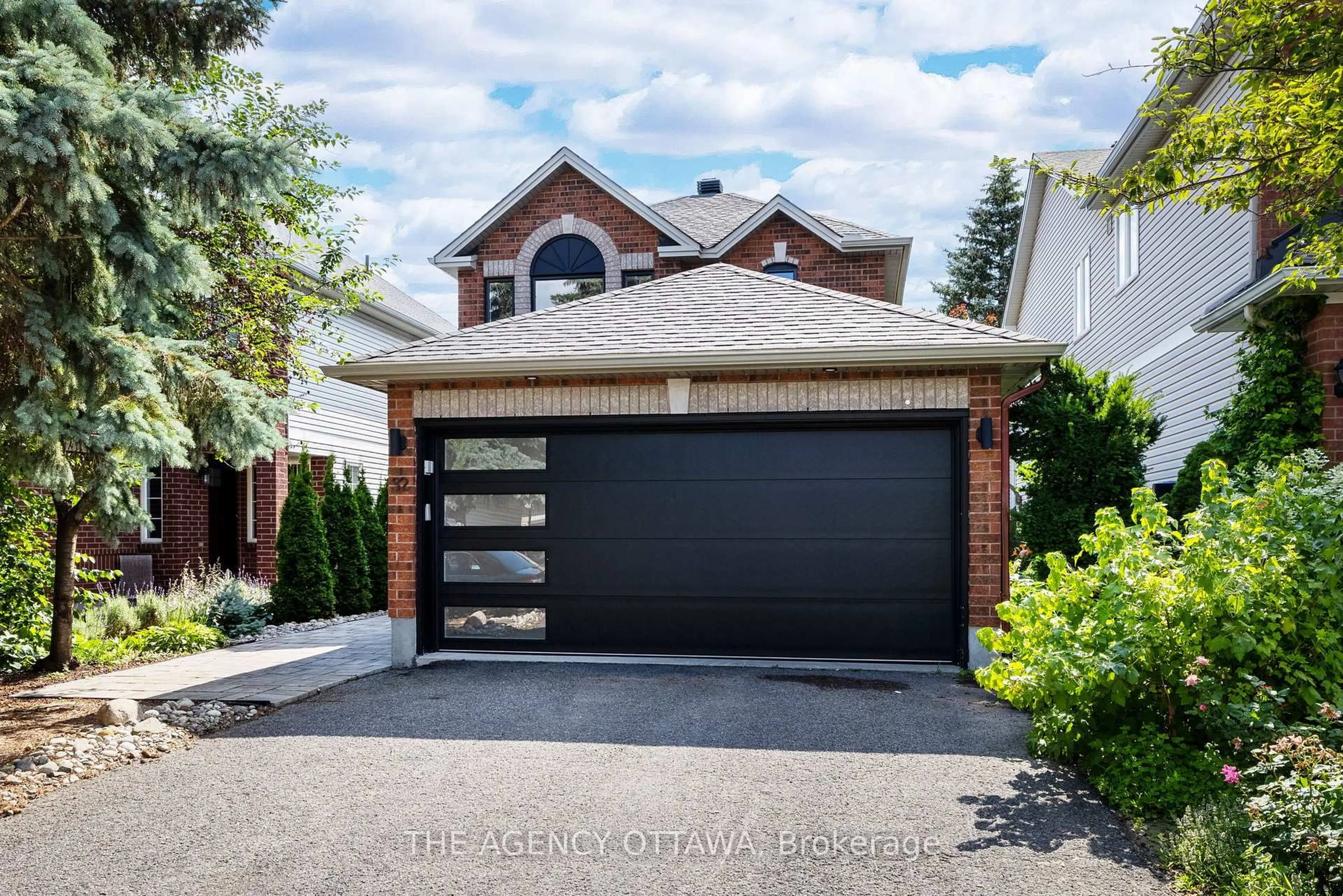 Home with brick exterior material, street for 32 WHITESTONE Dr, Ottawa Ontario K2C 4A9